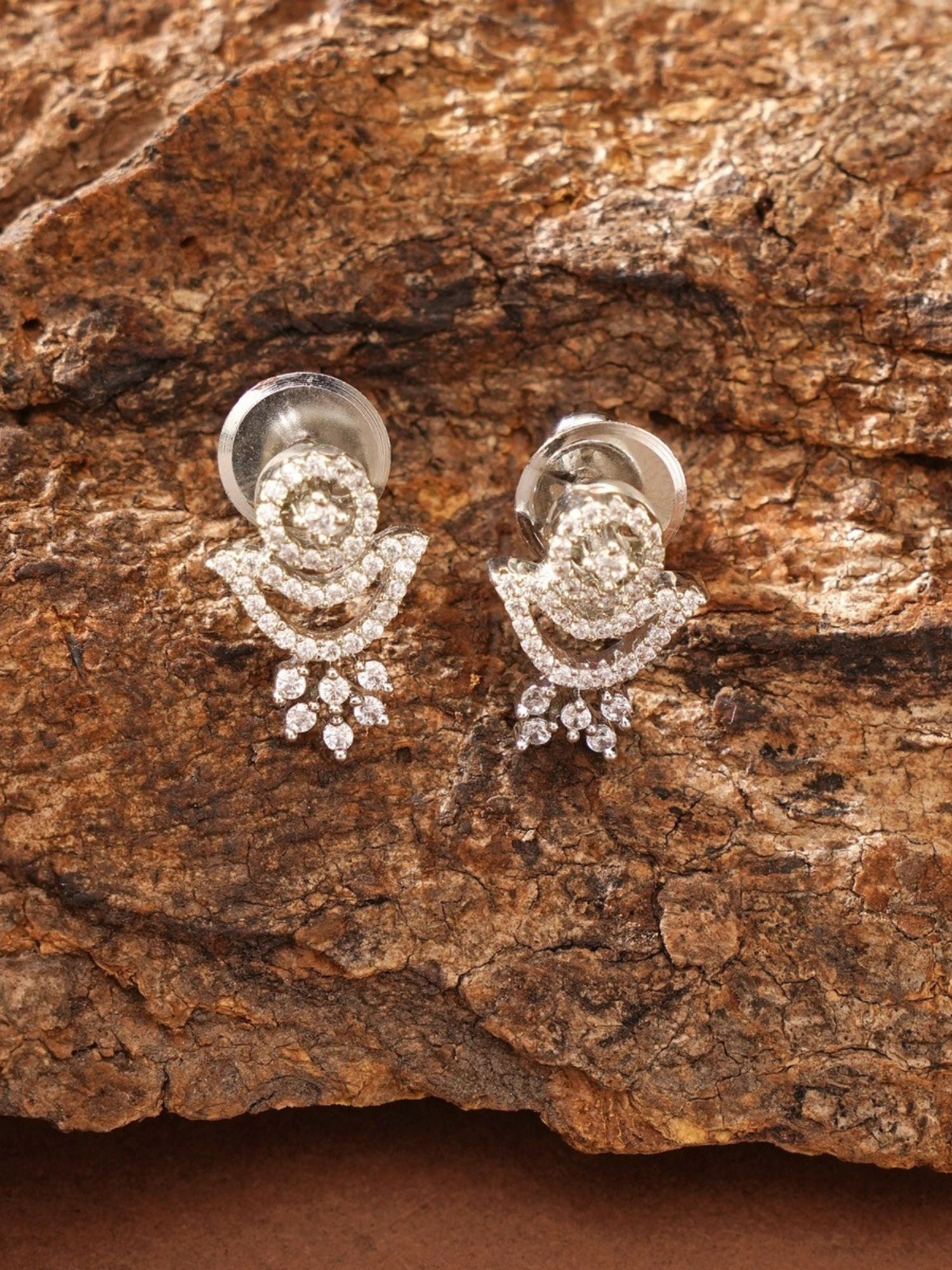 Abdesigns Jewellery Silver Plated American Diamond Mangalsutra With Earrings delicate stud earrings on rustic bark