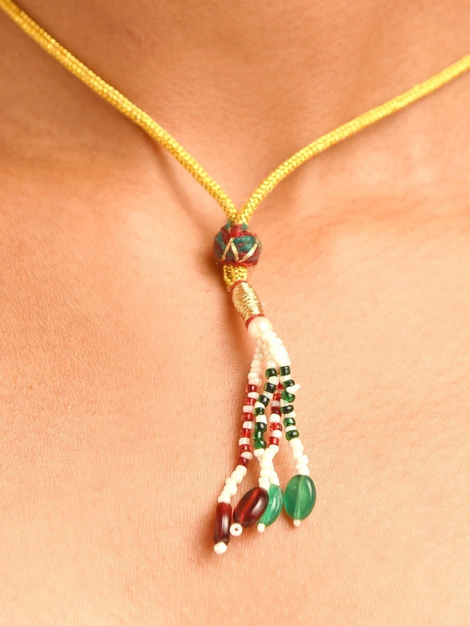 Abdesigns Jewellery Traditional Green Beaded Necklace on neckline with yellow cord and green red bead tassel