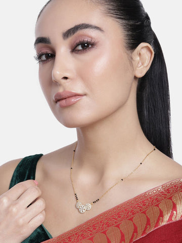 Abdesigns Precise Set of 2 gold plated mangalsutra combo for women. Woman wearing gold mangalsutra with black beads charm
