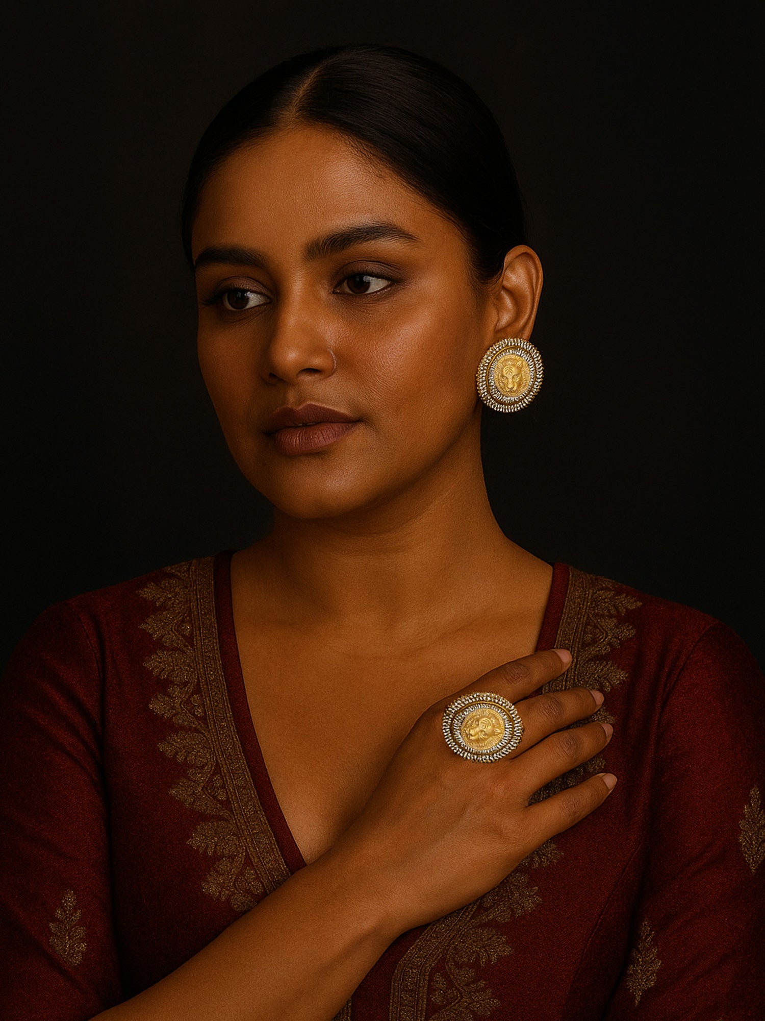 Abdesigns Sabyasachi inspired Gold Plated Earring And Ring Combo modeled by woman in maroon embroidered kurta