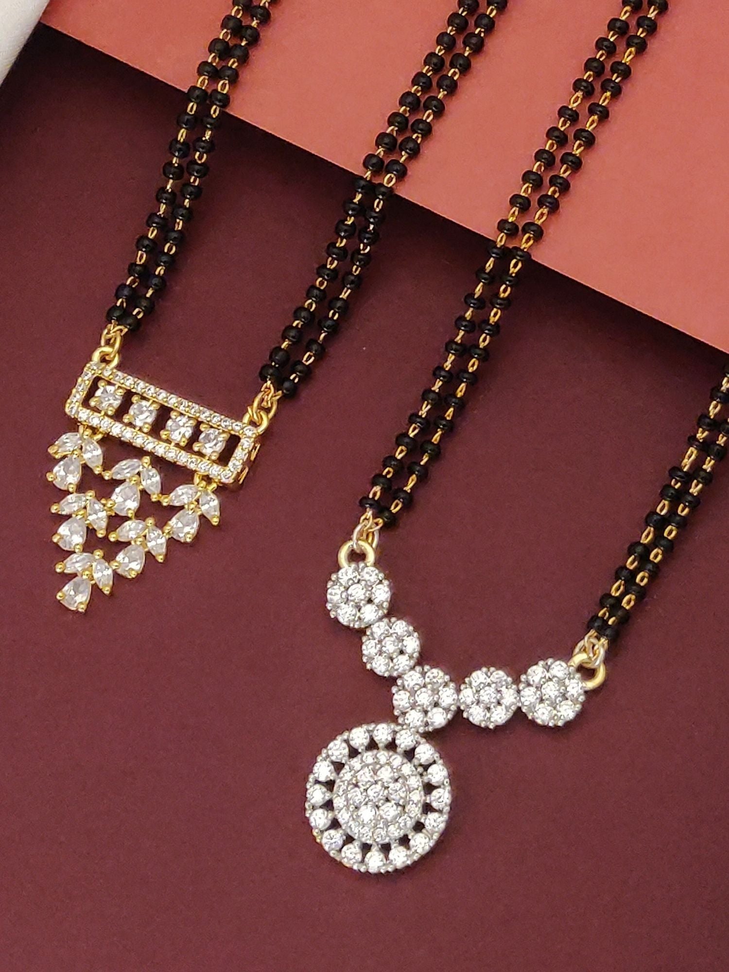 Abdesigns Set of 2 Detailed gold plated mangalsutra combo for women. Black bead necklaces with crystal pendants