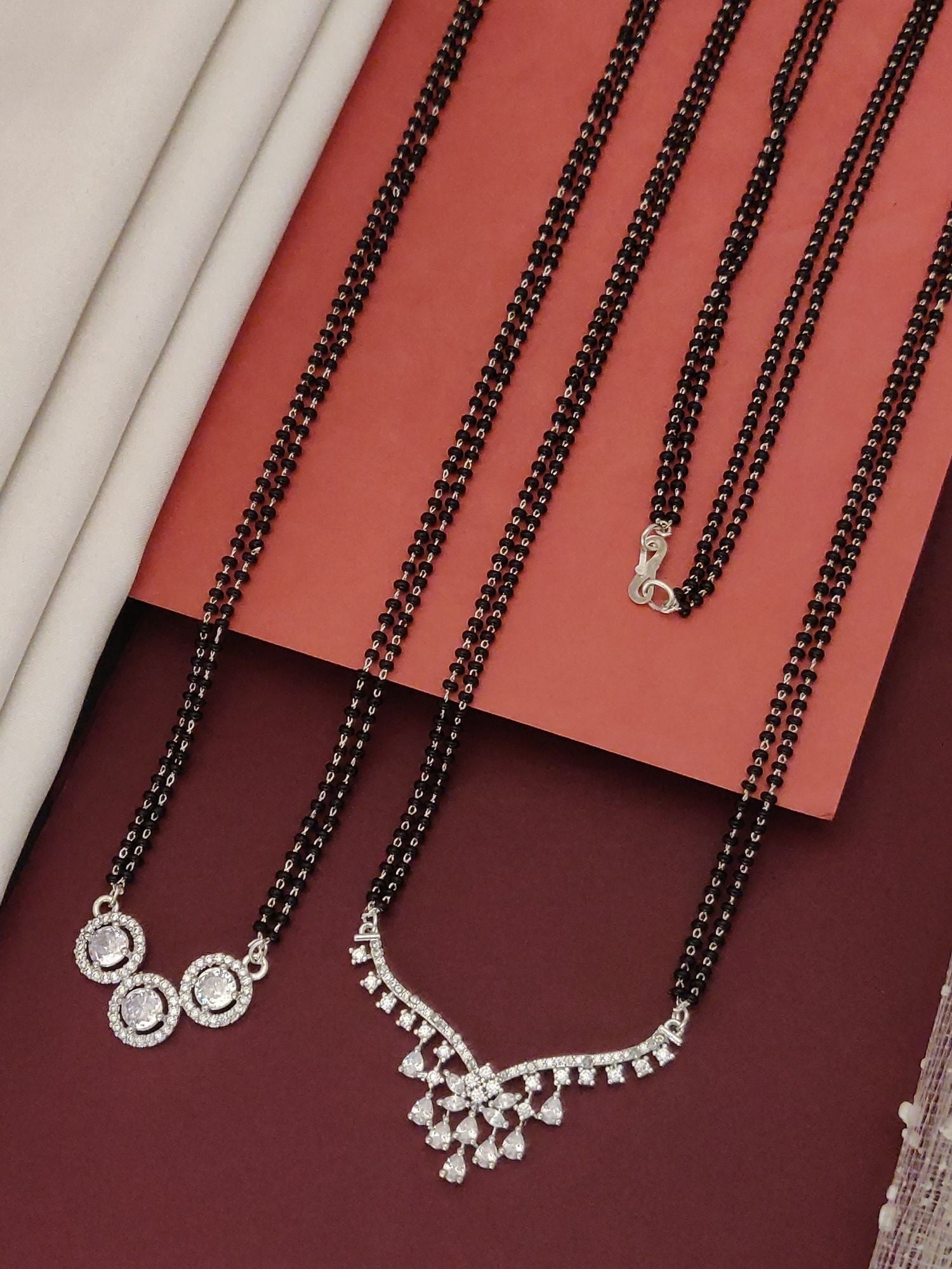 Abdesigns Set of 2 Fashionable silver plated mangalsutra combo for women two black beaded chains with round and V pendant