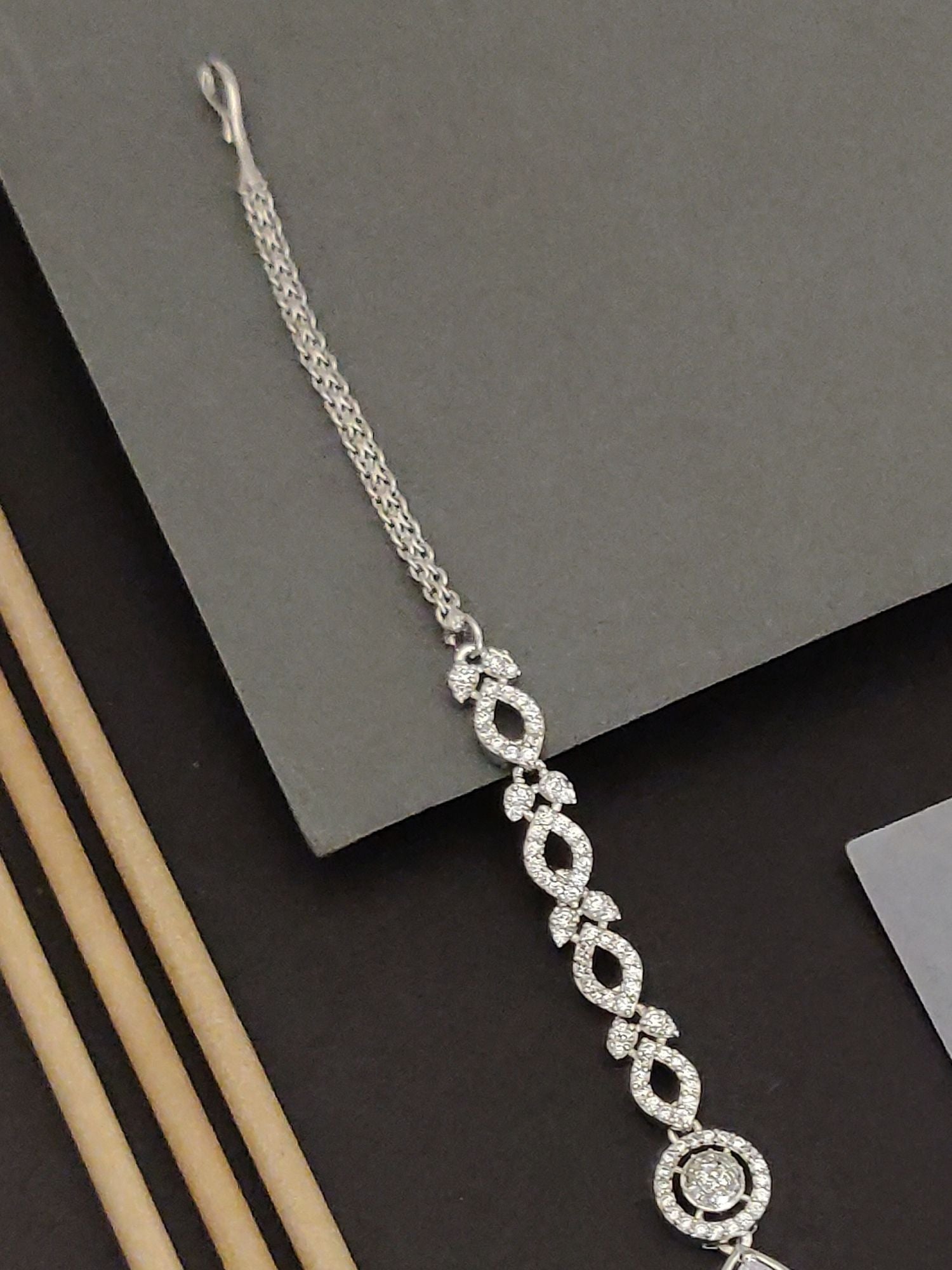 Abdesigns Silver CZ Bridal Maangtikka with linked oval CZ motifs and halo pendant on silver chain