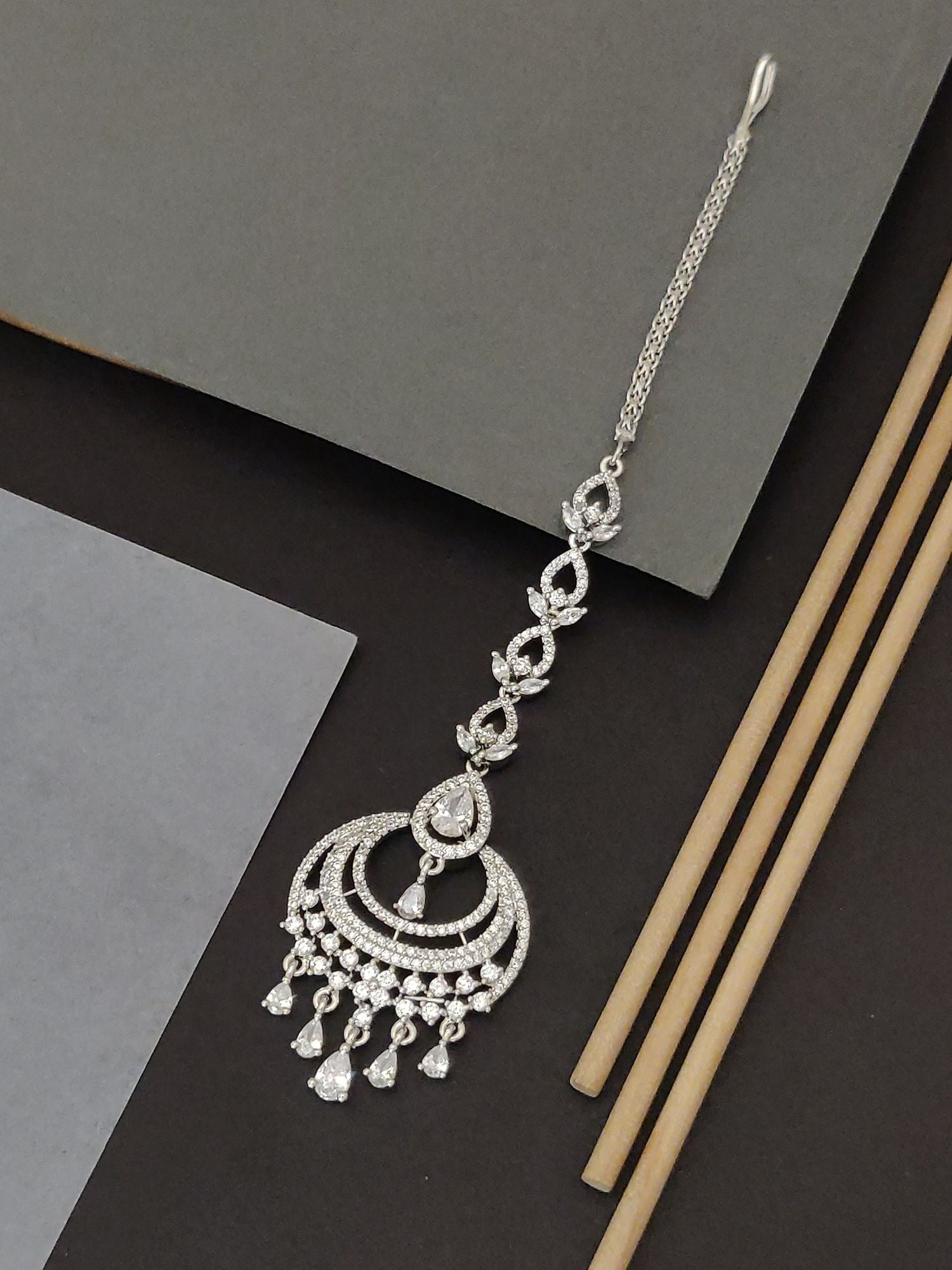 Abdesigns Silver CZ Maangtikka Chandelier Pendant showing intricate teardrop CZ dangles on silver chain maangtikka