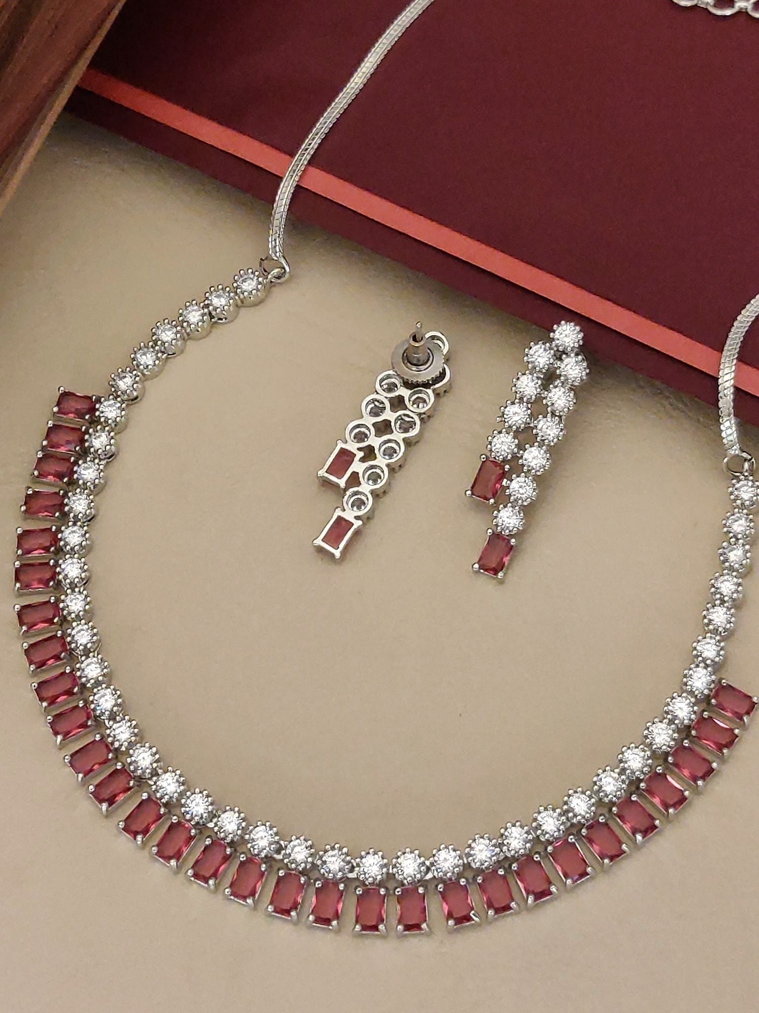 Abdesignsjewellery American diamond necklace set with red rectangular stones and clear round crystals in silver