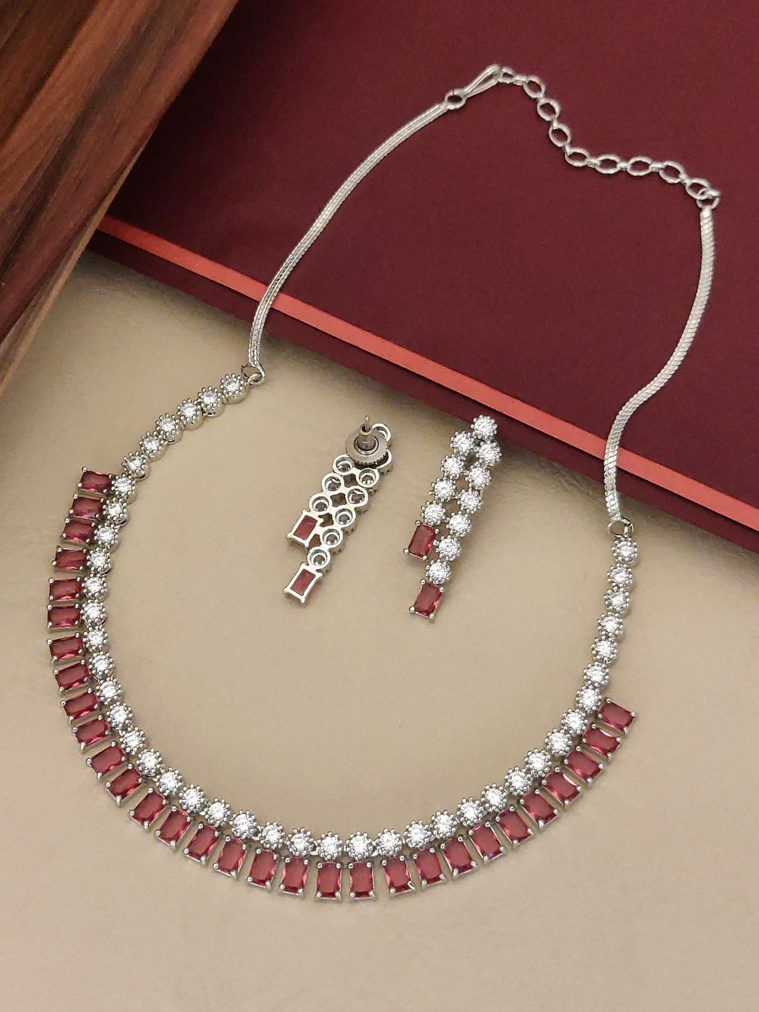 Abdesignsjewellery American diamond necklace set with red rectangular stones and round clear crystals in silver