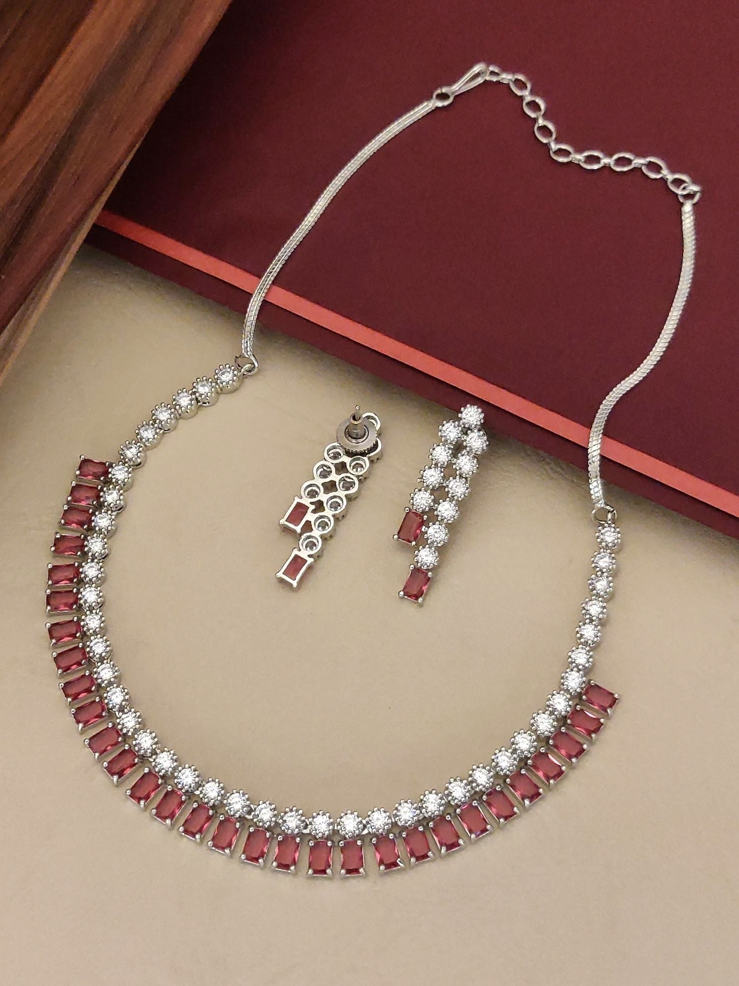 Abdesignsjewellery American diamond necklace set with ruby red stones and matching drop earrings in silver