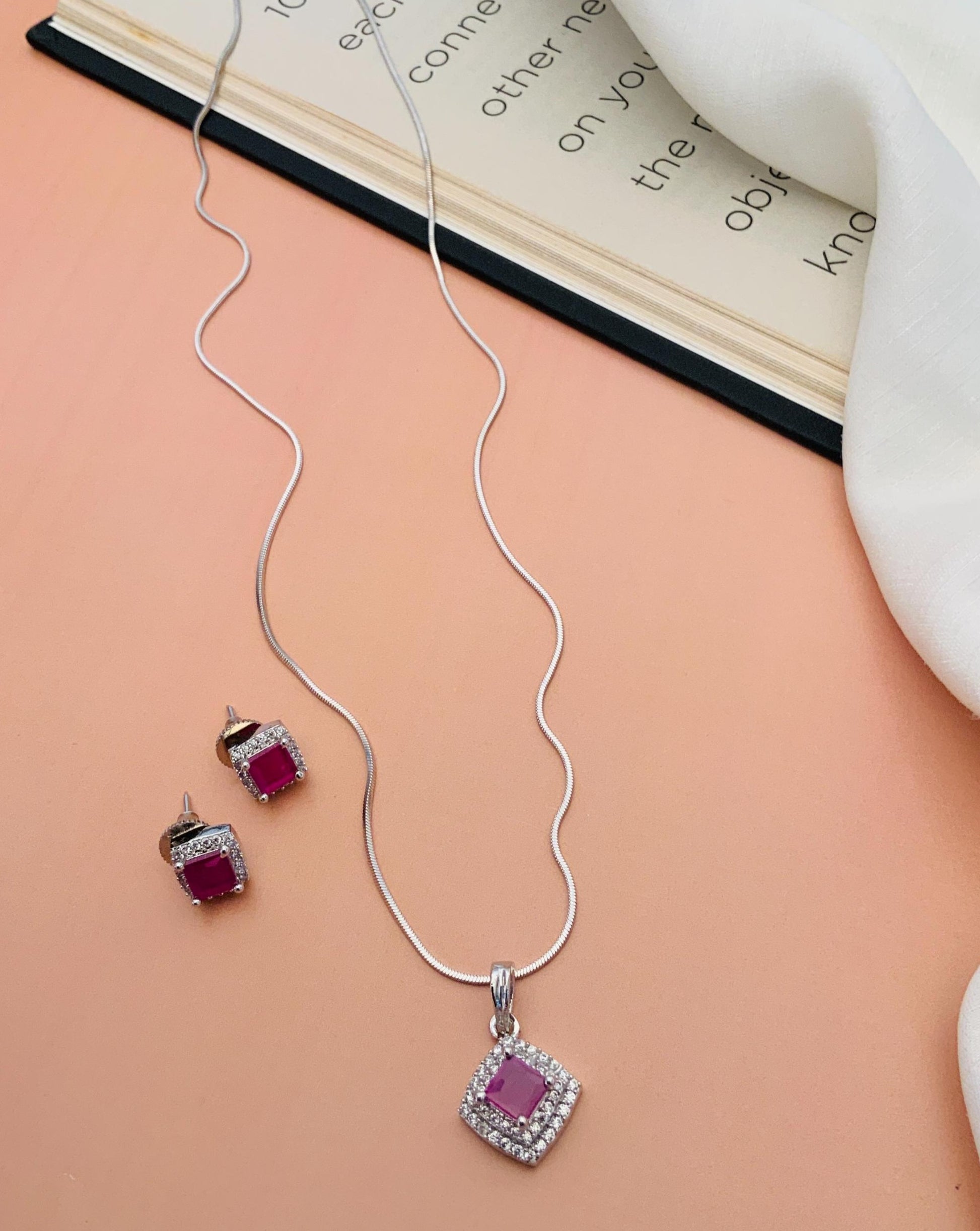 Abdesignsjewellery silver necklace and matching studs with pink square stones and halo american diamond pendant set for daily wear