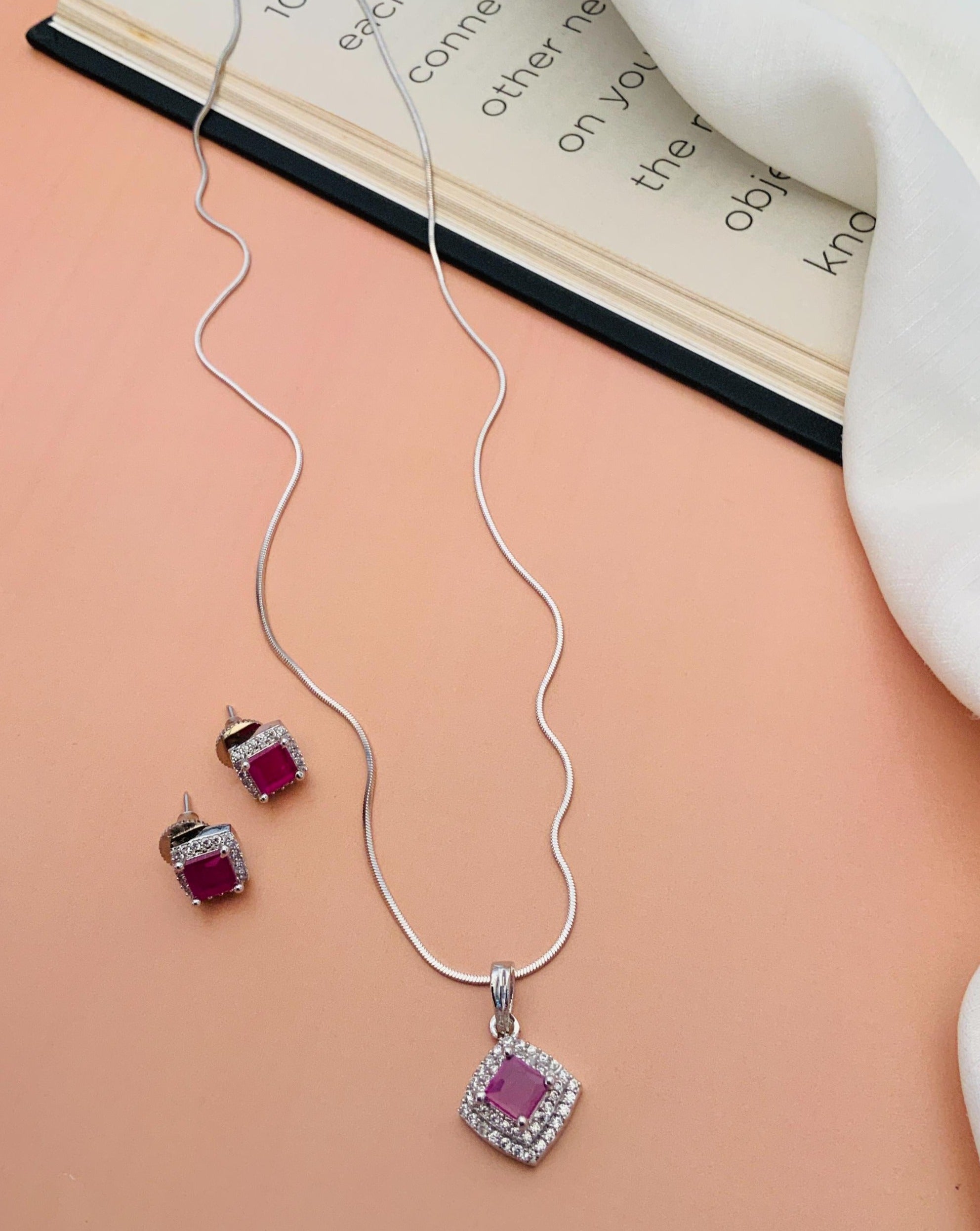 Abdesignsjewellery silver necklace and matching studs with pink square stones and halo american diamond pendant set for daily wear