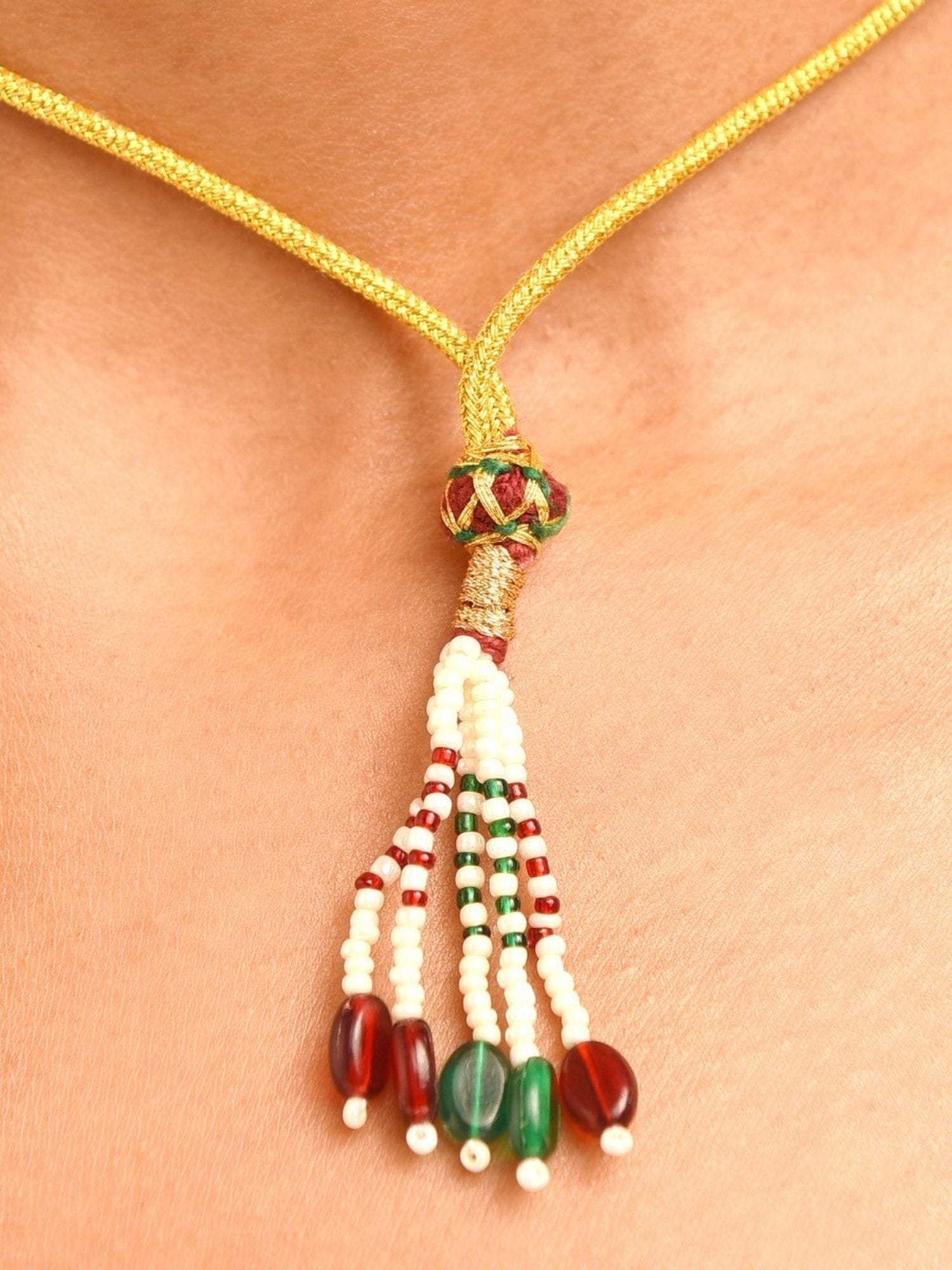 Abdesignsjewellery antique gold plated necklace set with braided cord and red green bead tassel