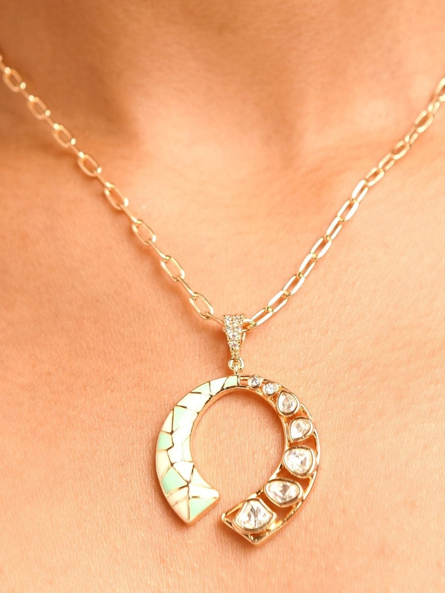 Antique Gold Plated Polki Pendant Set With Earrings horseshoe pendant on chain with polki stones on model