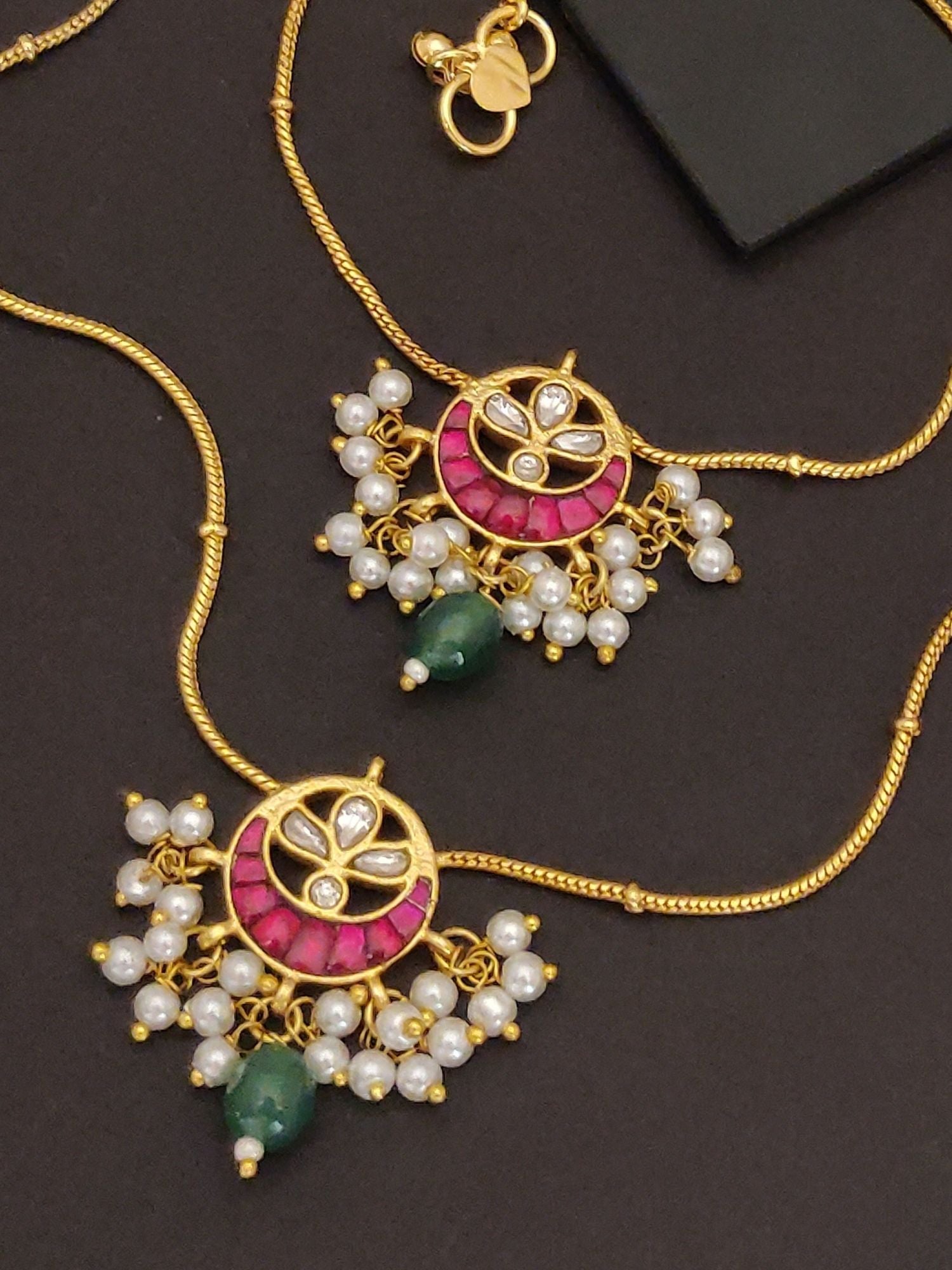 Abdesignsjewellery gold tone pair of artificial anklets with stones and pearls featuring pink enamel and green beads
