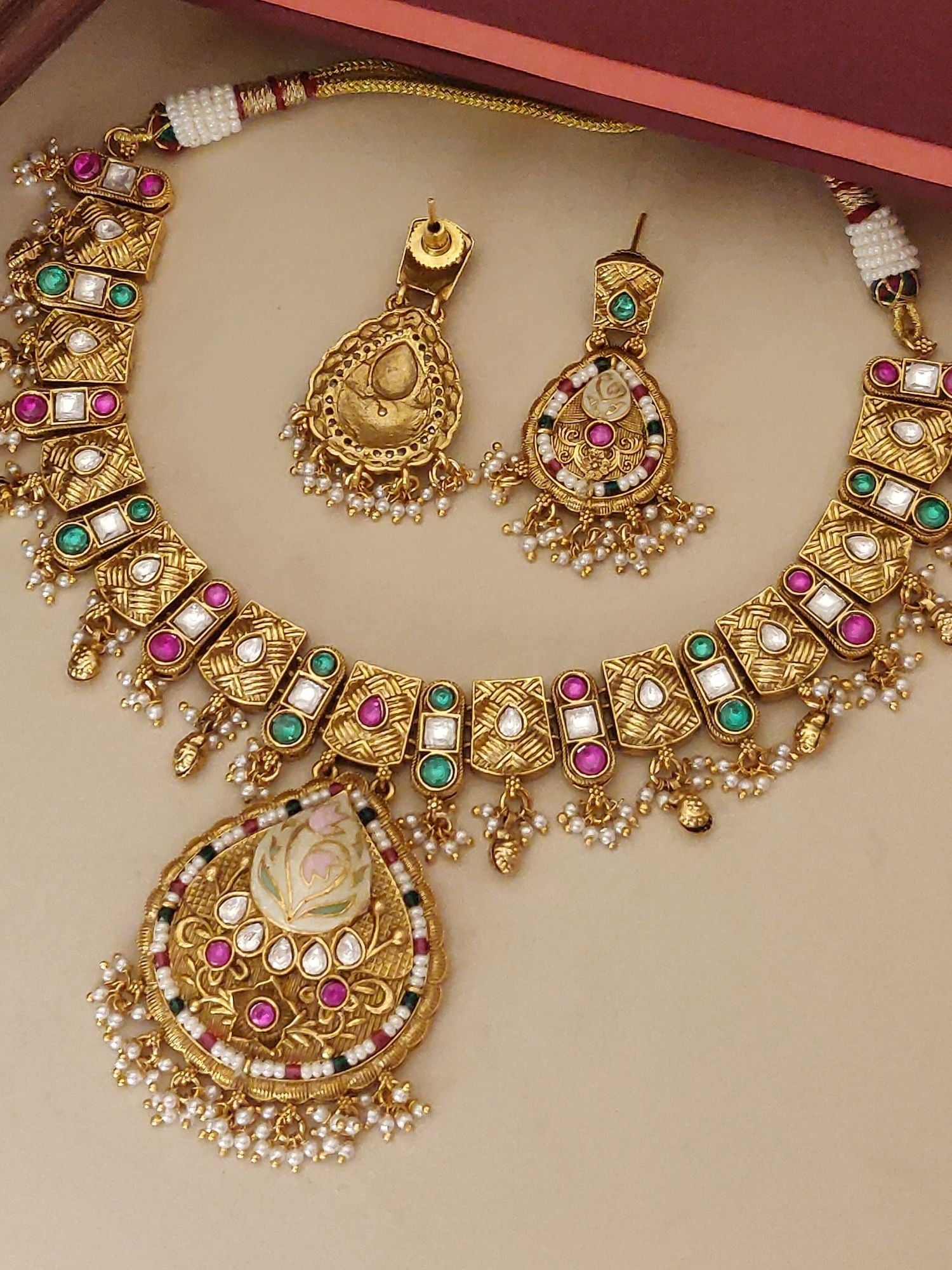 Abdesignsjewellery artificial gold maangtikka necklace earrings set Kundan style with green and pink stones and pearl drops