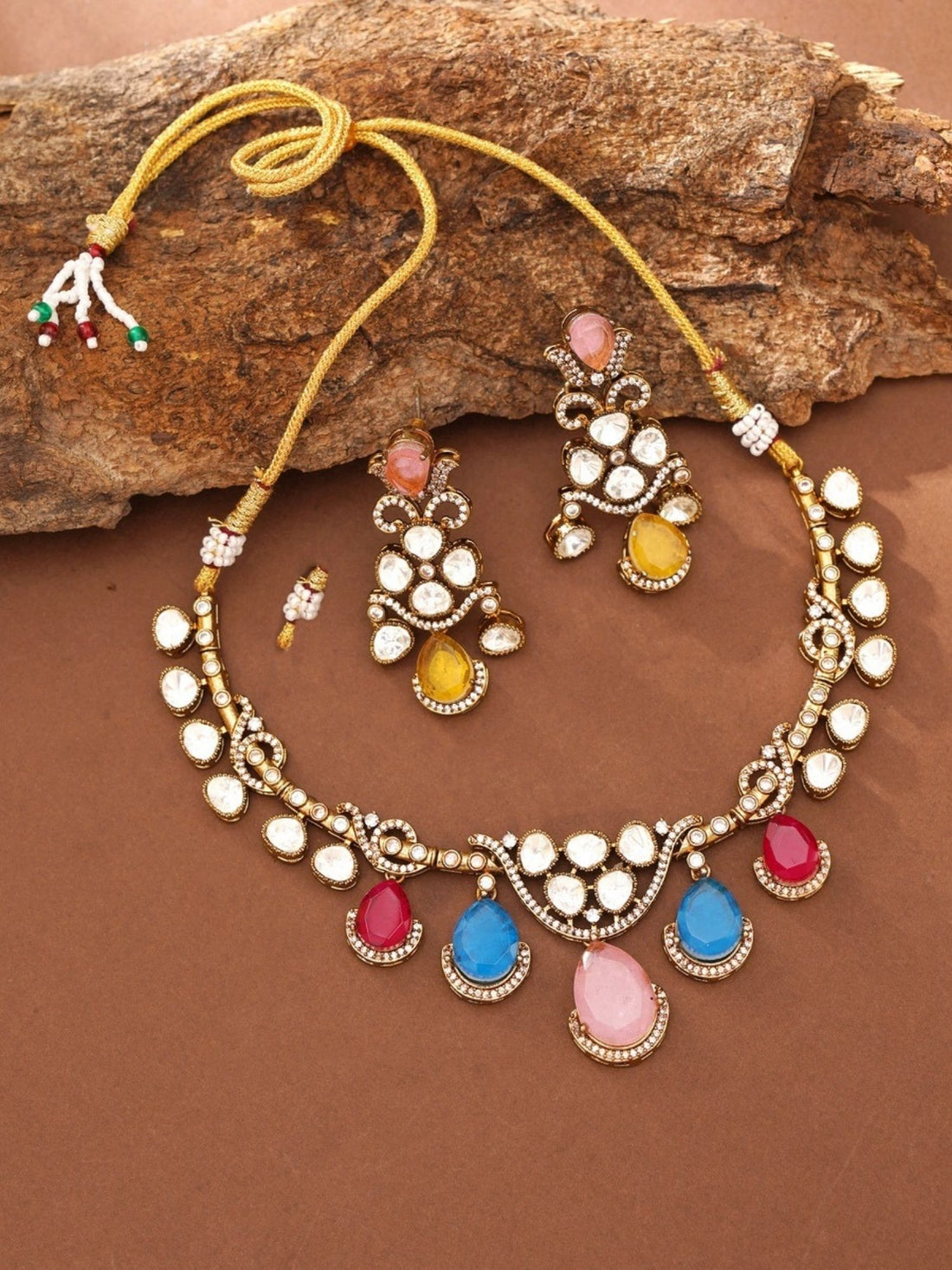 Abdesignsjewellery model wearing artificial gold plated multicolour choker set with kundan and teardrop stones