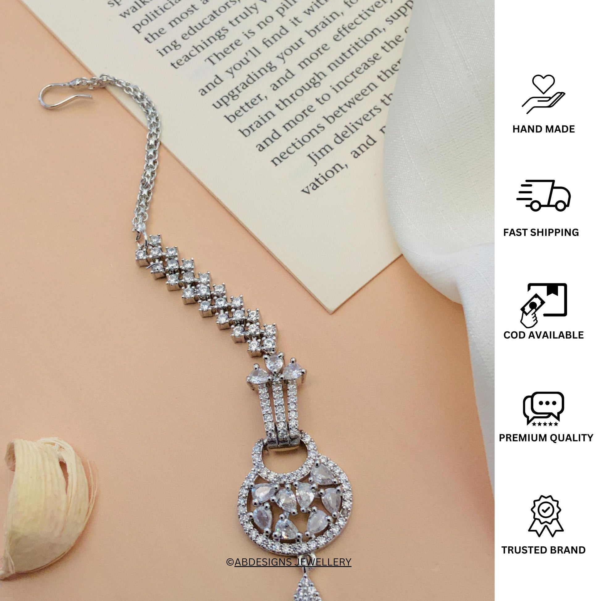 Beautiful Silver Plated American Diamond Maangtikka by Abdesignsjewellery with intricate crystal design