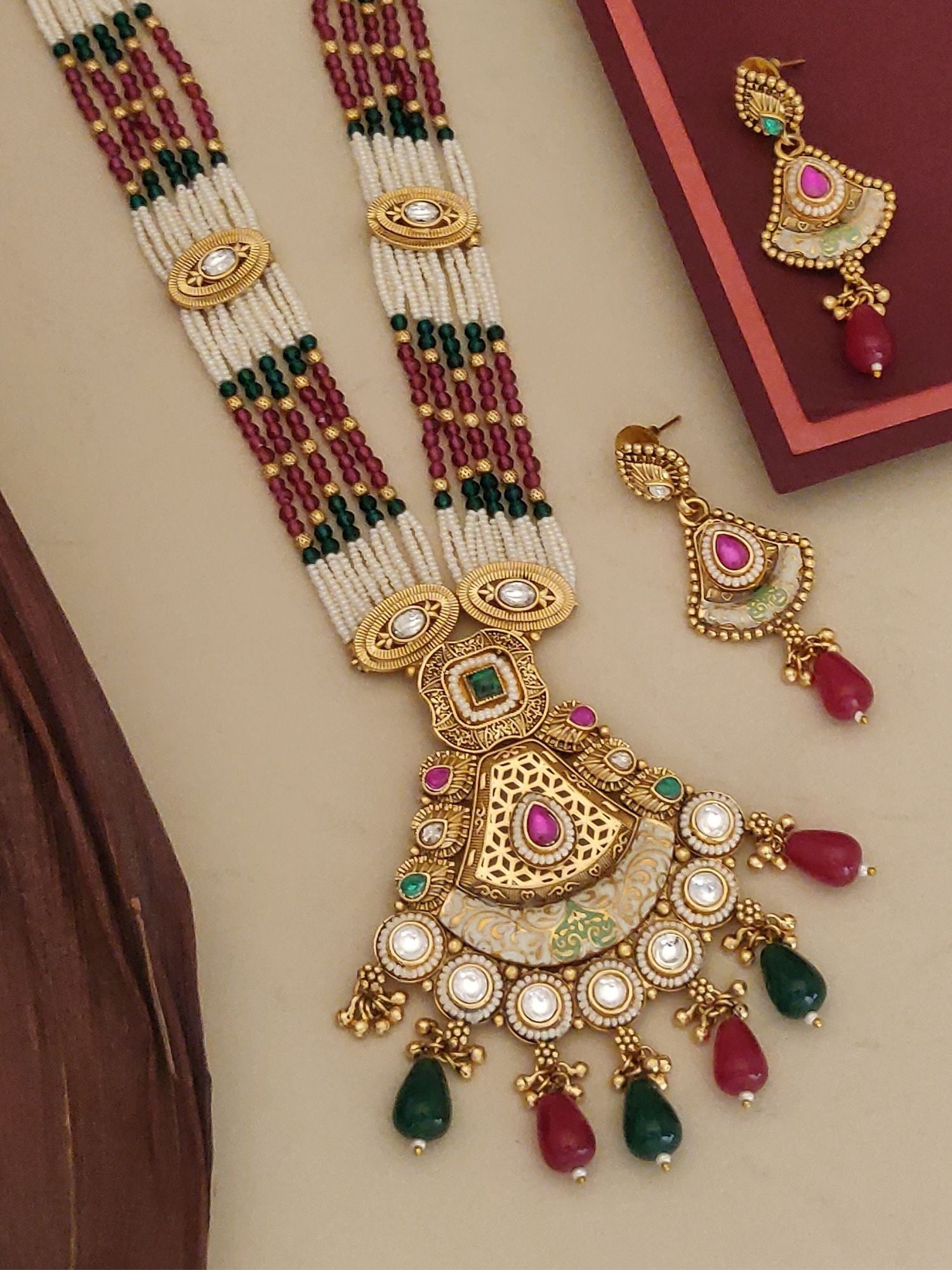 Bridal Long Gold Plated Artificial Stone Beads Necklace Set featuring multistrand white red and green beads with pendant earrings