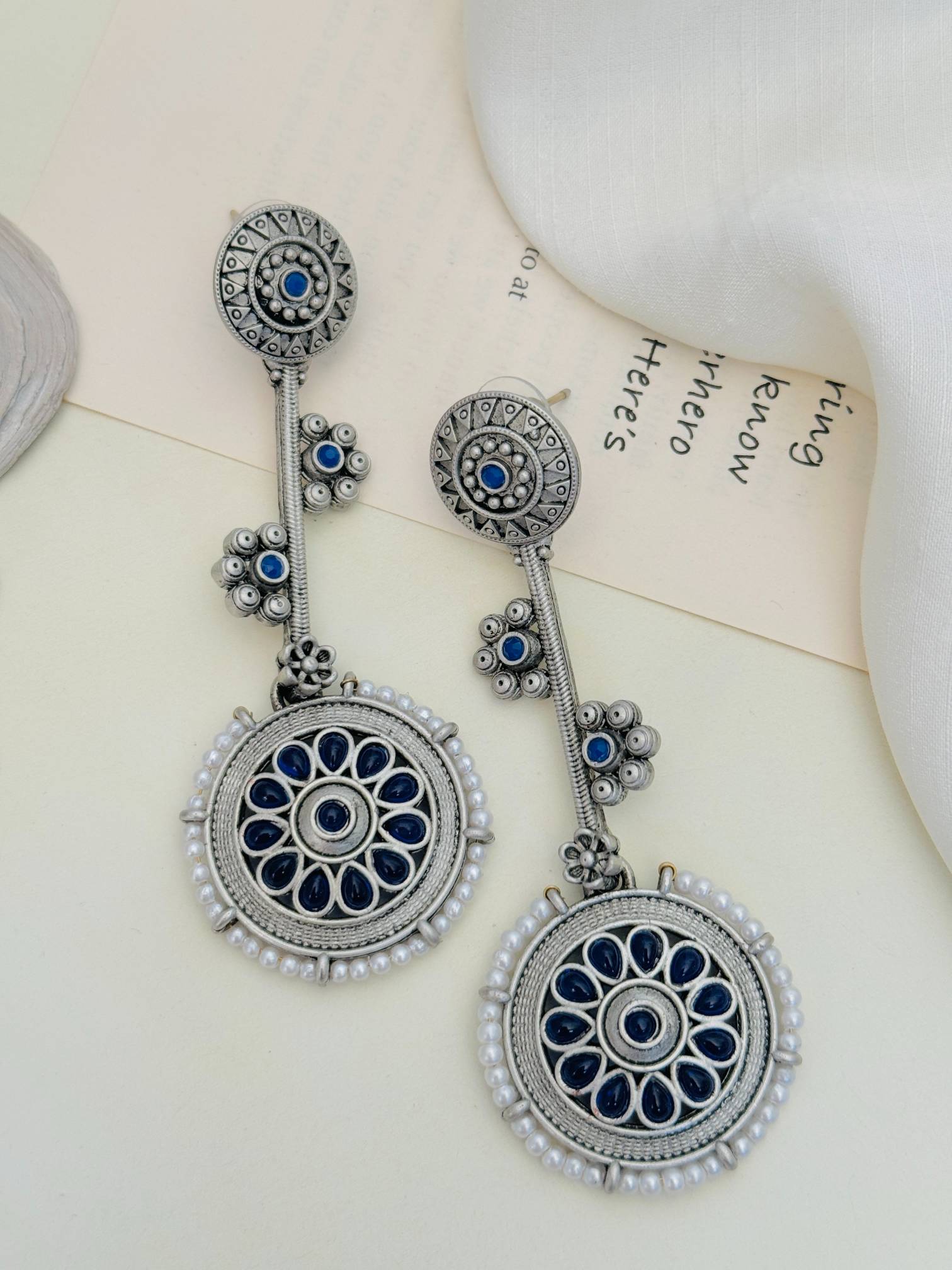 Contemporary German Silver Round Earring with intricate blue and silver floral design by Abdesignsjewellery