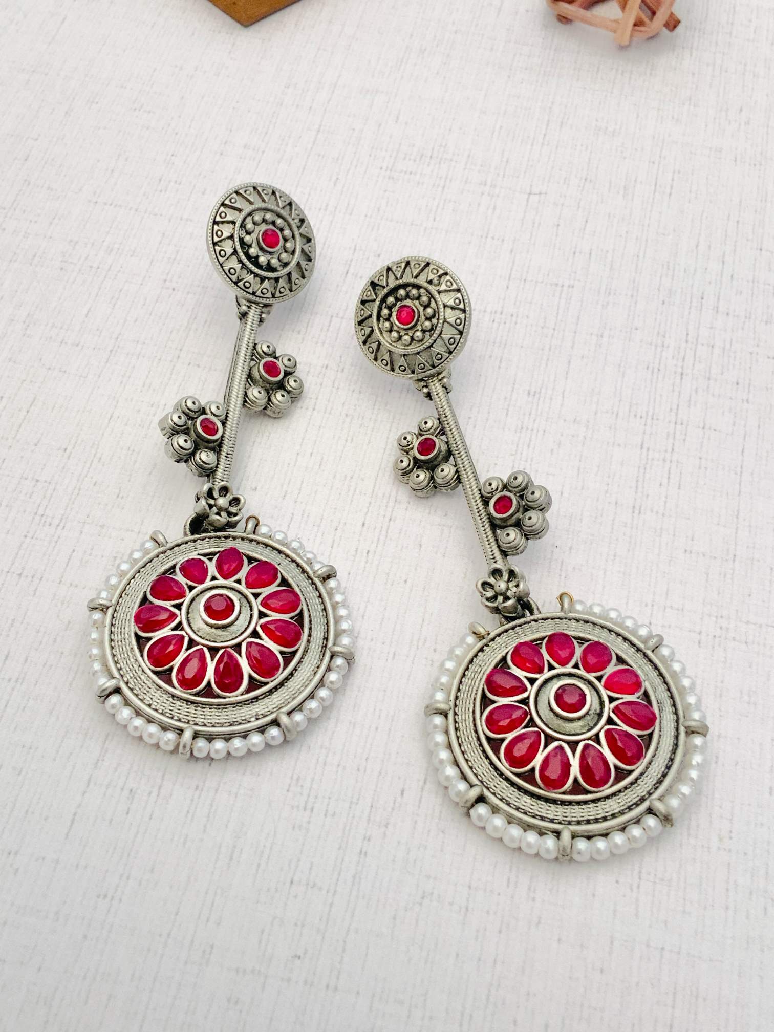 Abdesignsjewellery Contemporary German Silver Round Earring with red stones and pearl accents