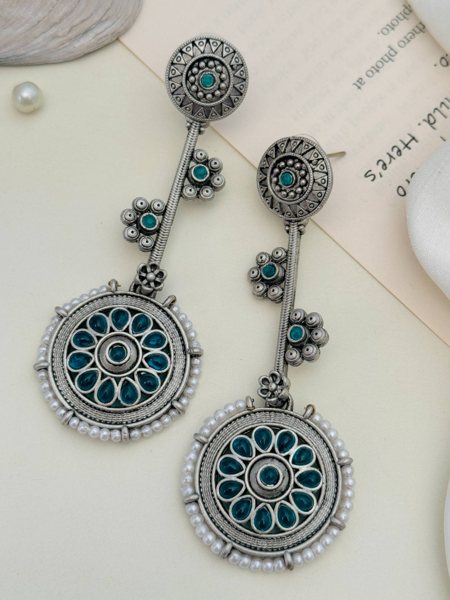 Contemporary German Silver Round Earring with intricate floral design and turquoise accents by Abdesignsjewellery