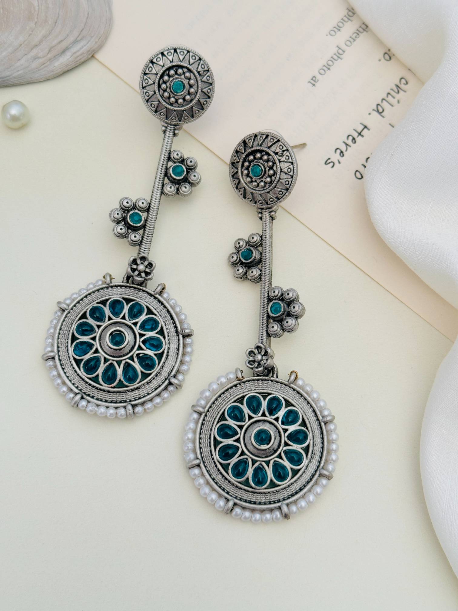 Contemporary German Silver Round Earring by Abdesignsjewellery featuring intricate blue and silver detailing with dangling design