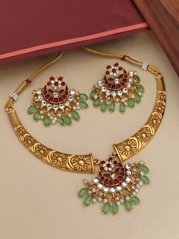 Gold floral Indian necklace set with red stones pearls and green beads designer fashion necklace set for women