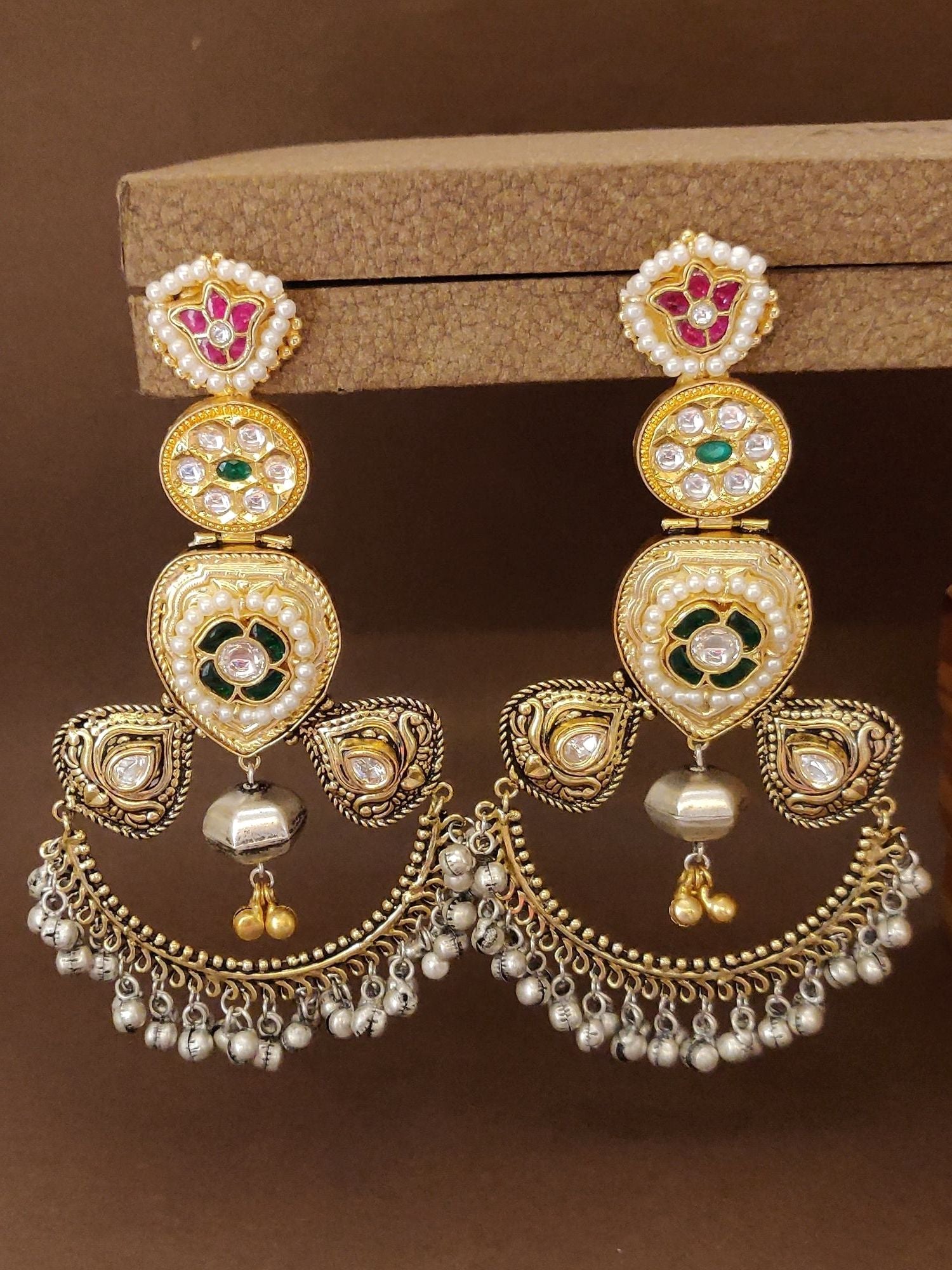 Abdesignsjewellery dual tone Chandbali earrings with intricate pearls and green red stone detailing