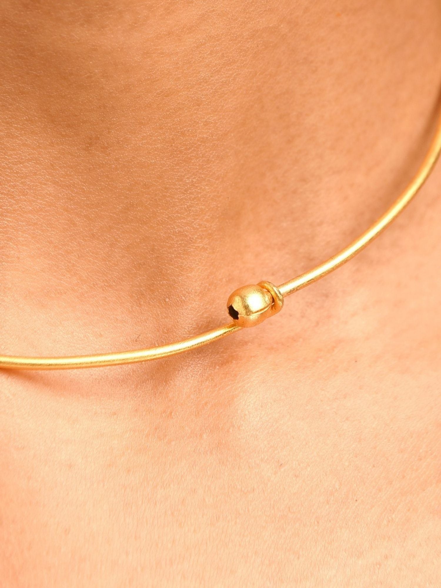 Abdesignsjewellery elegant artificial ruby necklace minimalist gold choker with central polished bead on model neck