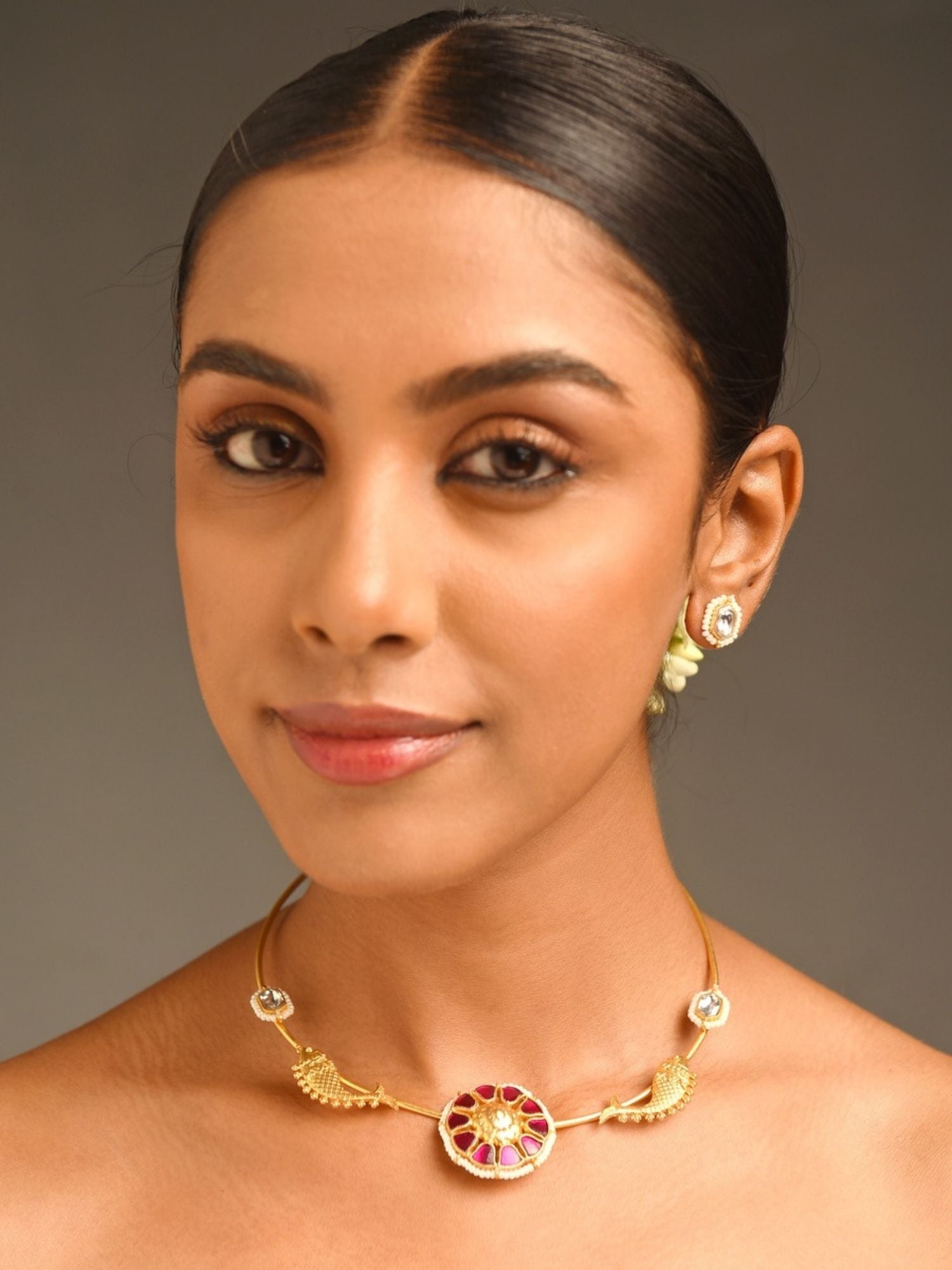 Abdesignsjewellery elegant artificial ruby necklace with gold round pendant leaf accents worn on model