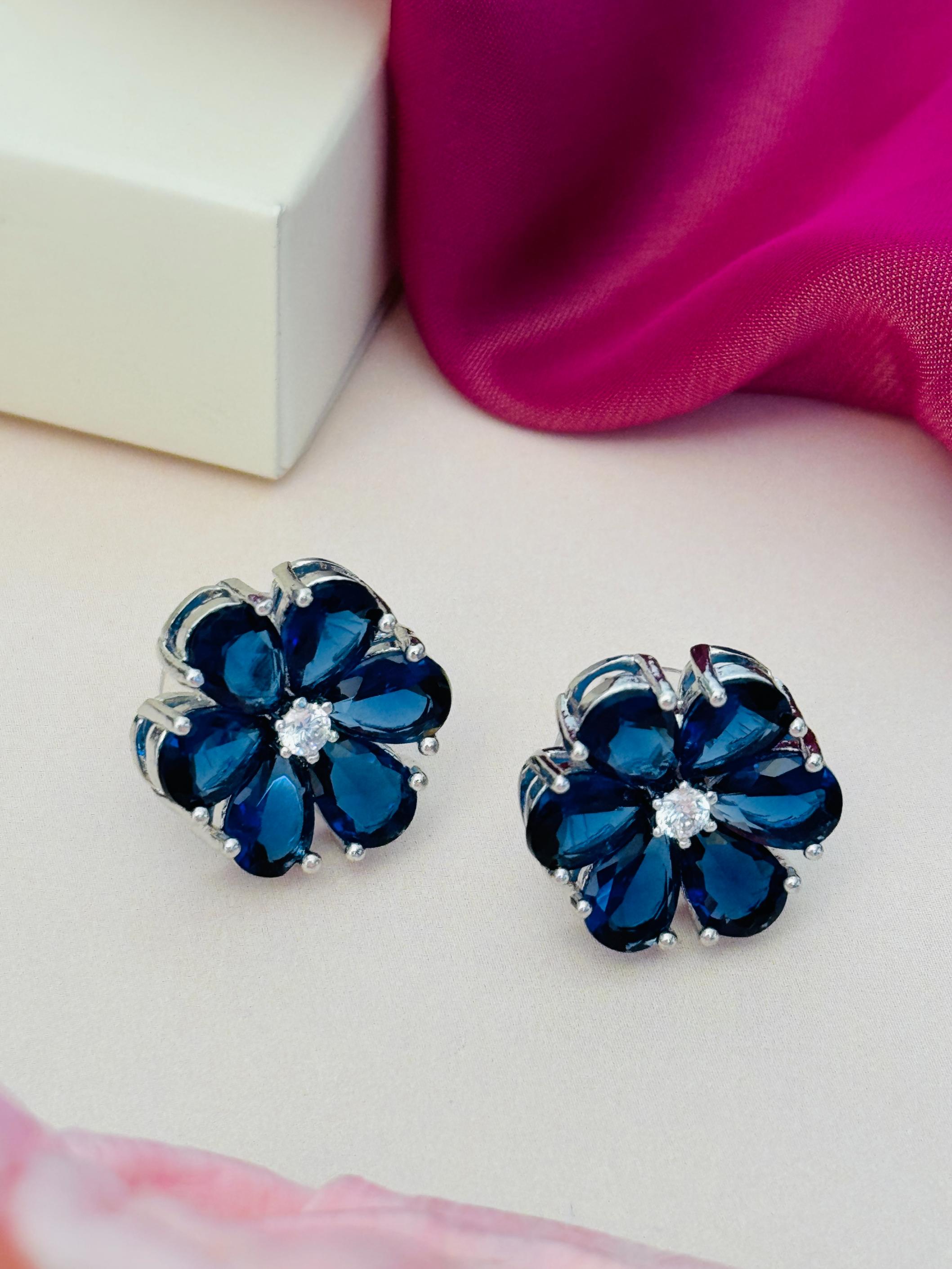 Elegant Green Stone Earrings By Abdesigns Jewellery. dark blue floral stud earrings in silver with clear center crystal