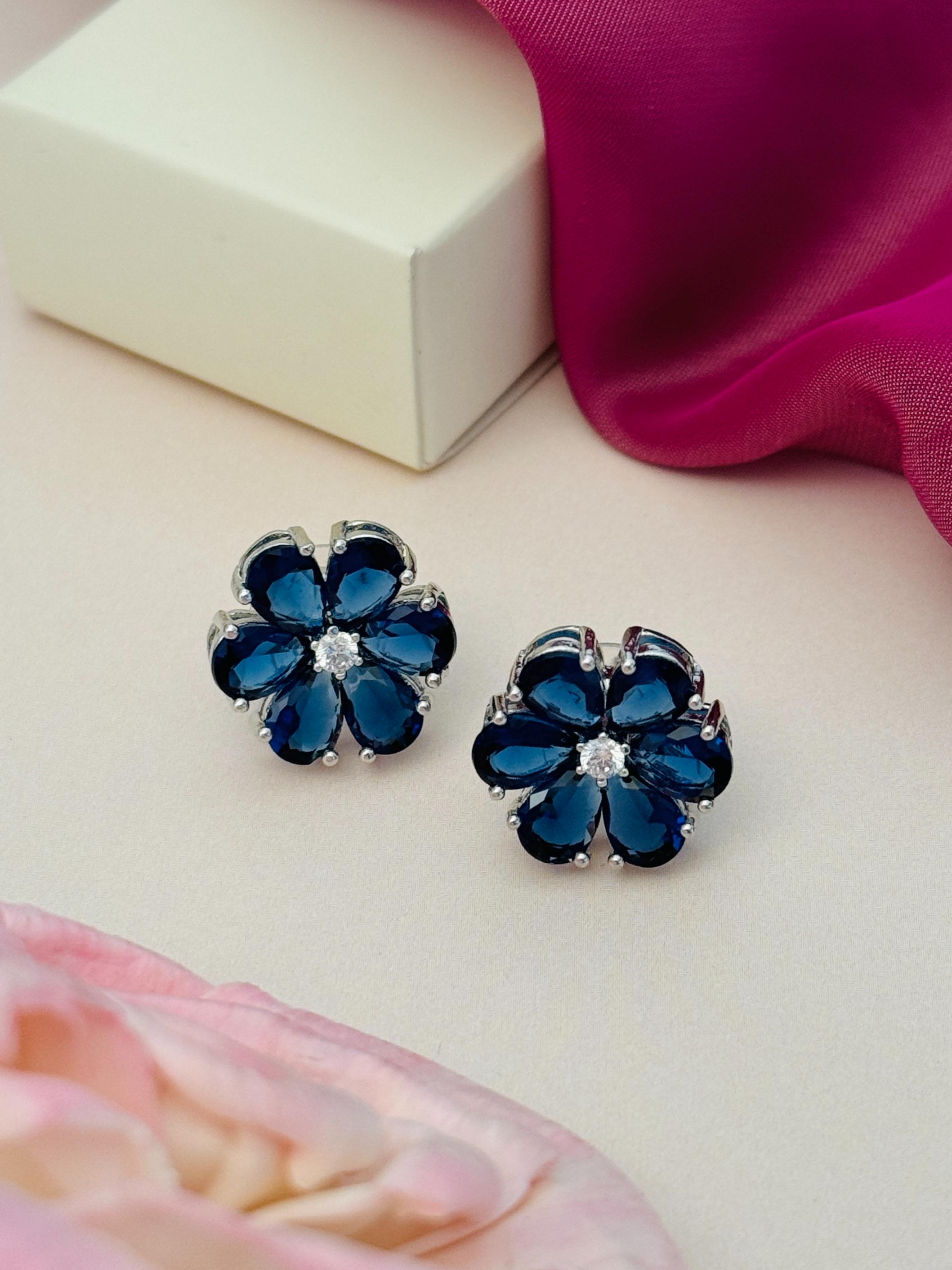 Elegant Green Stone Earrings By Abdesigns Jewellery. floral stud earrings with deep blue petal stones and center crystal