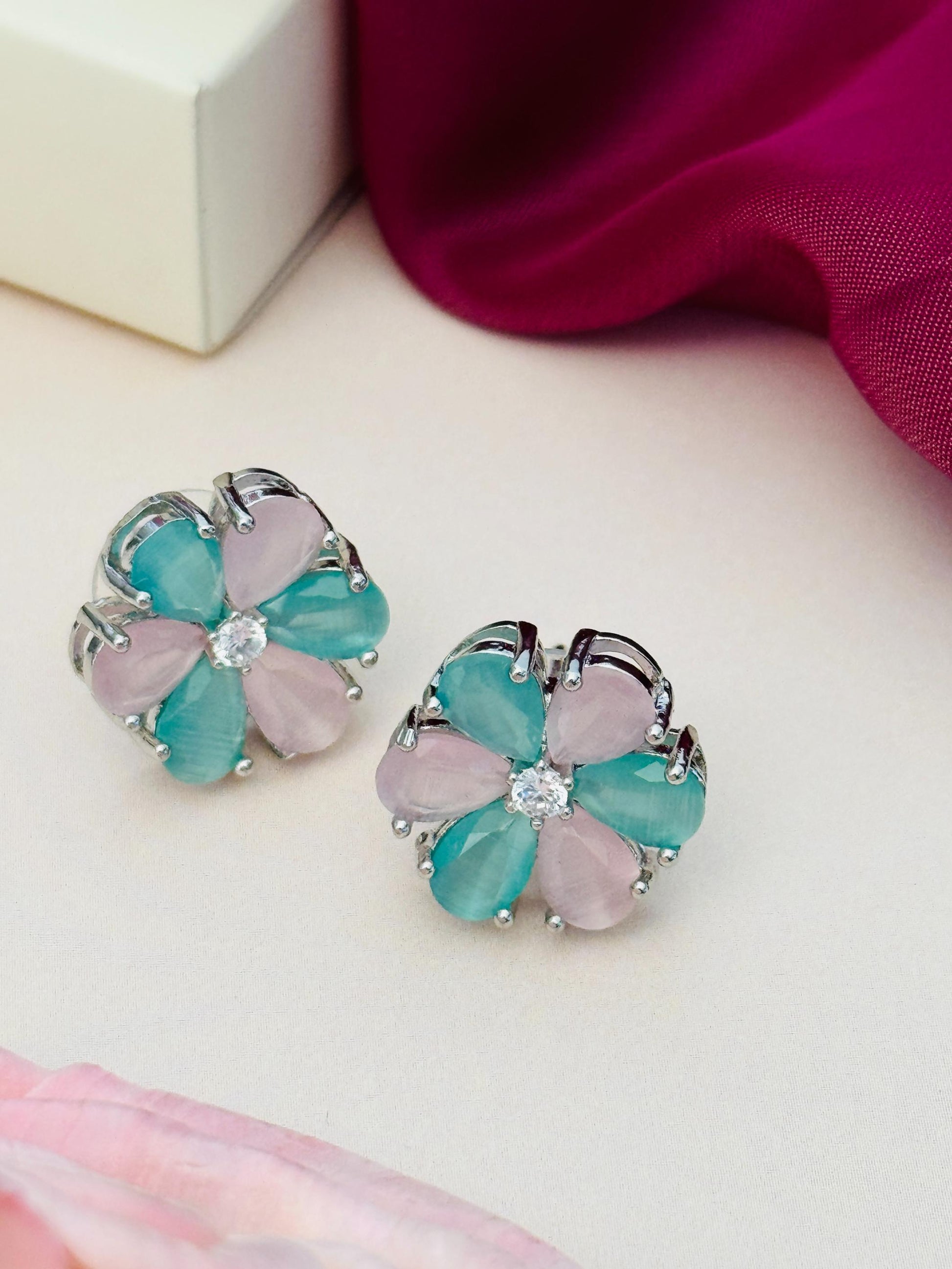 Elegant Green Stone Earrings By Abdesigns Jewellery. Floral stud earrings with green and pale pink petals and crystal center