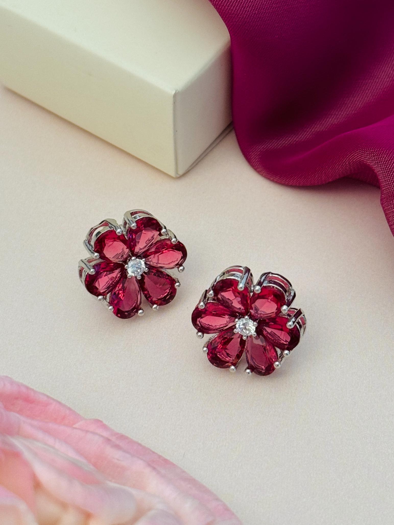 Elegant Green Stone Earrings By Abdesigns Jewellery. Pink flower stud earrings with silver prong setting and clear center stones