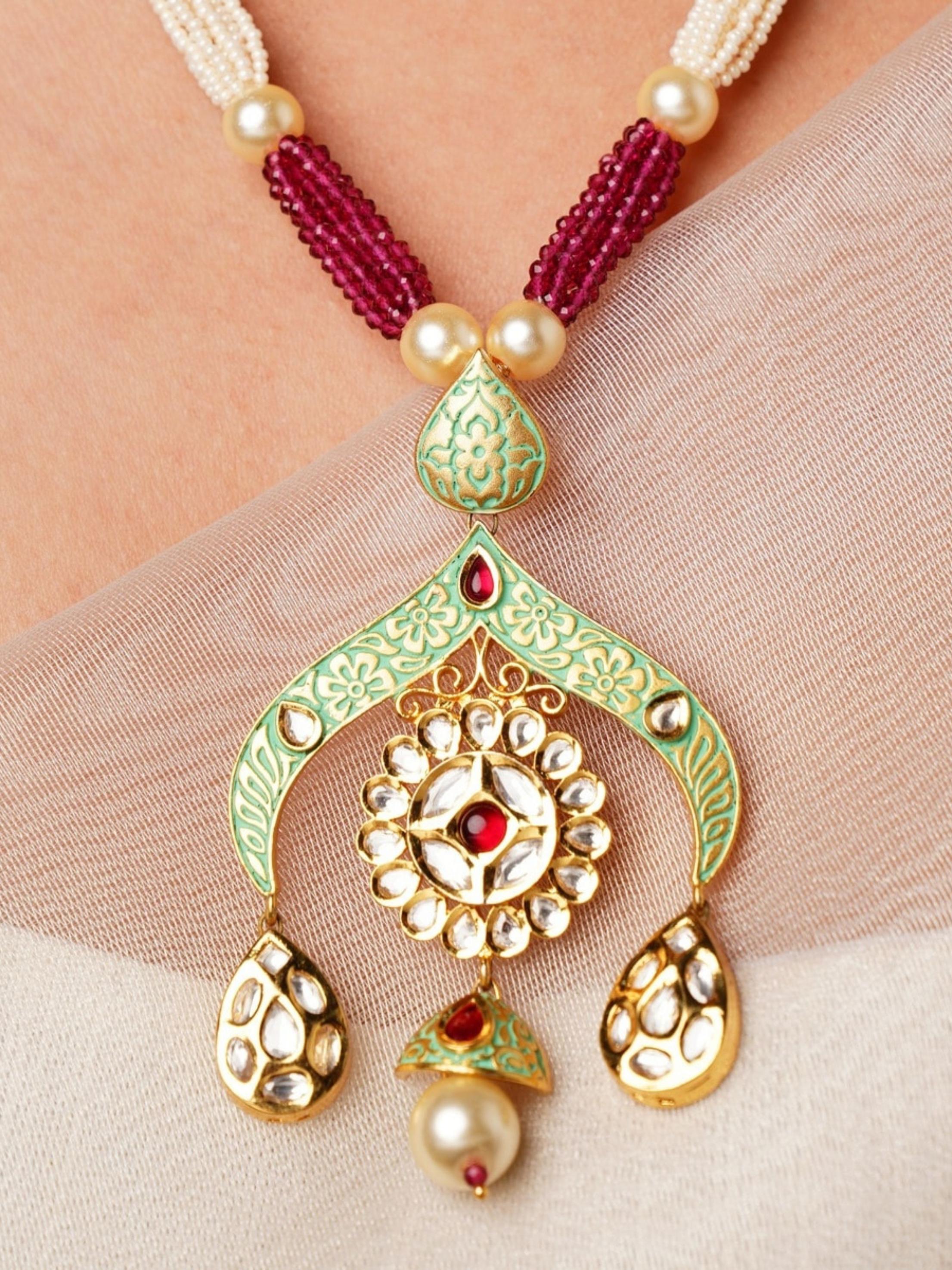 Elegant High Quality Kundan Necklace Set with intricate green and gold pendant and pearl accents from Abdesignsjewellery