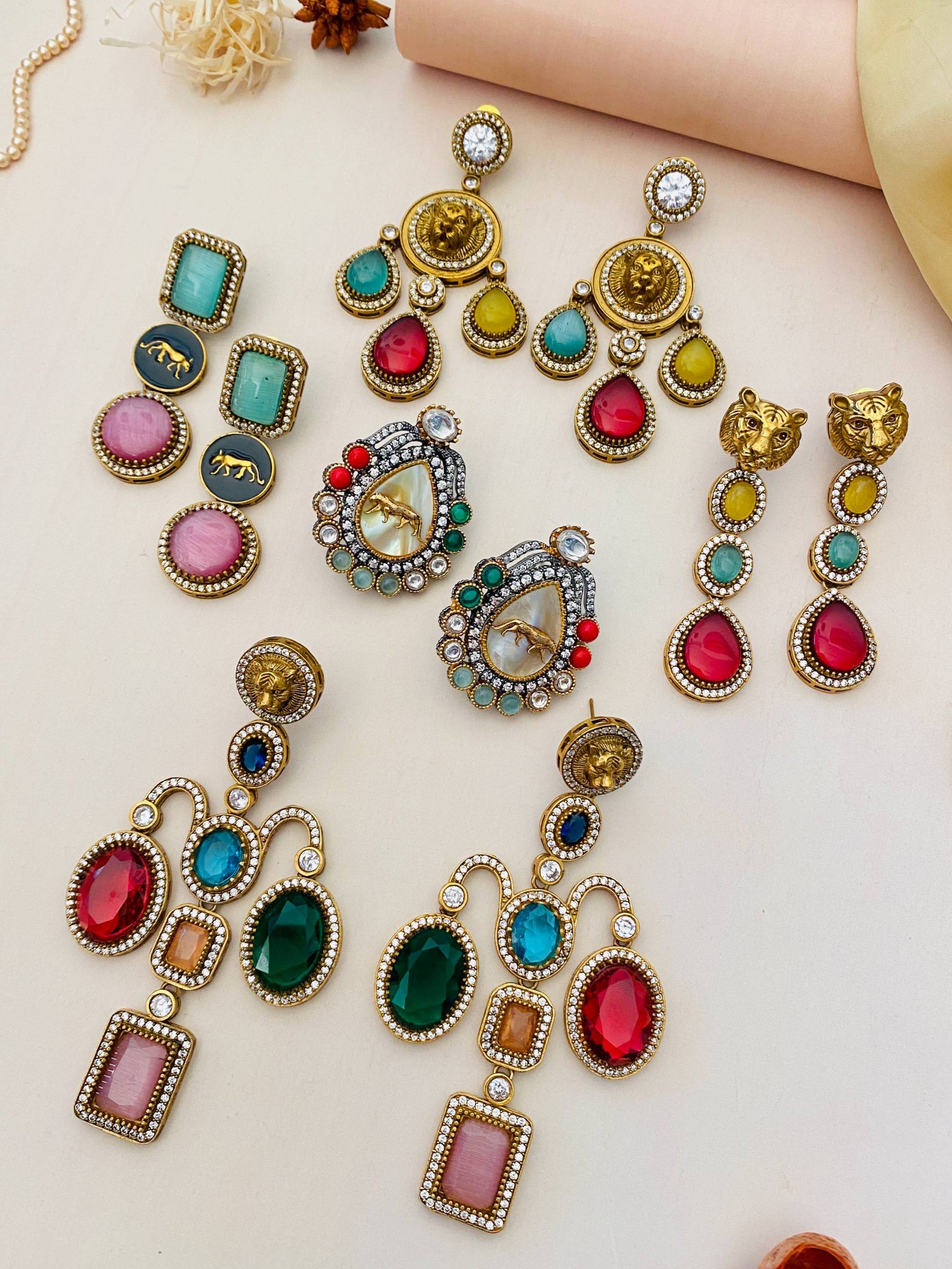 Assorted Abdesignsjewellery statement earrings in various colors and styles for elegant outfits