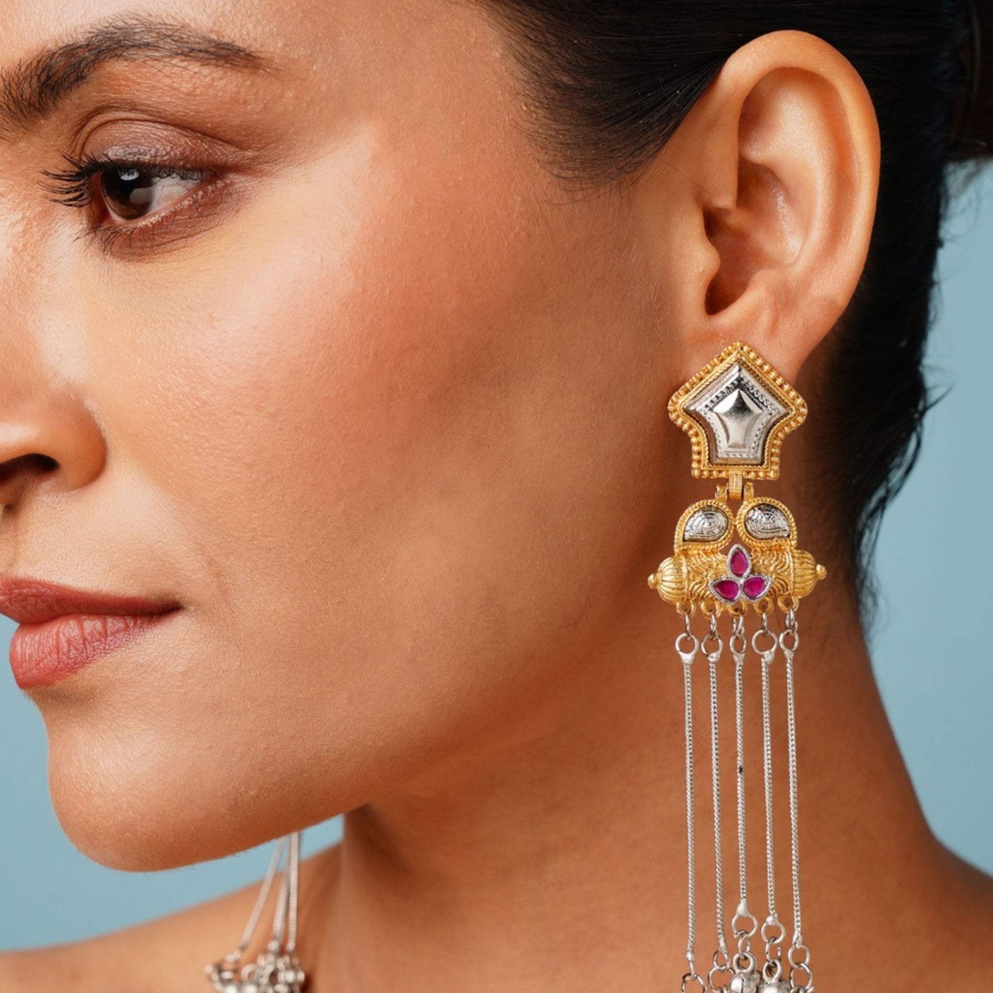 Exotic Long Gold Plated Earring by Abdesigns Jewellery worn on a woman with intricate design and hanging chains