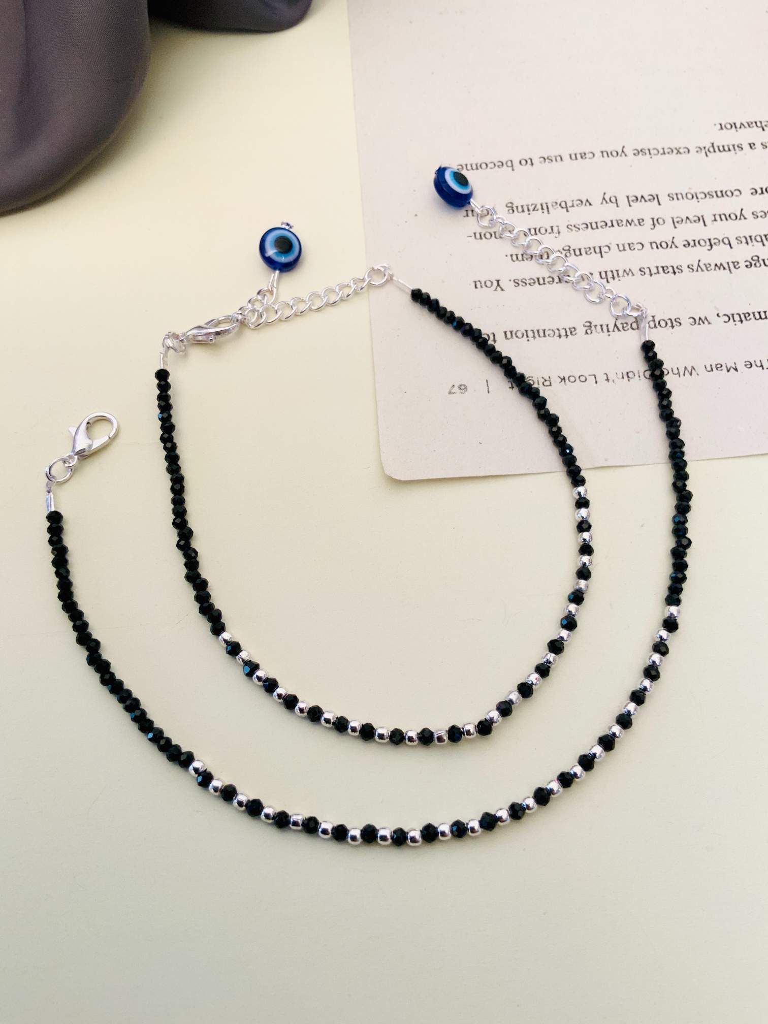 Eye Catching Silver Plated Evil Eye Anklet combo with black beads and blue evil eye charm by Abdesignsjewellery