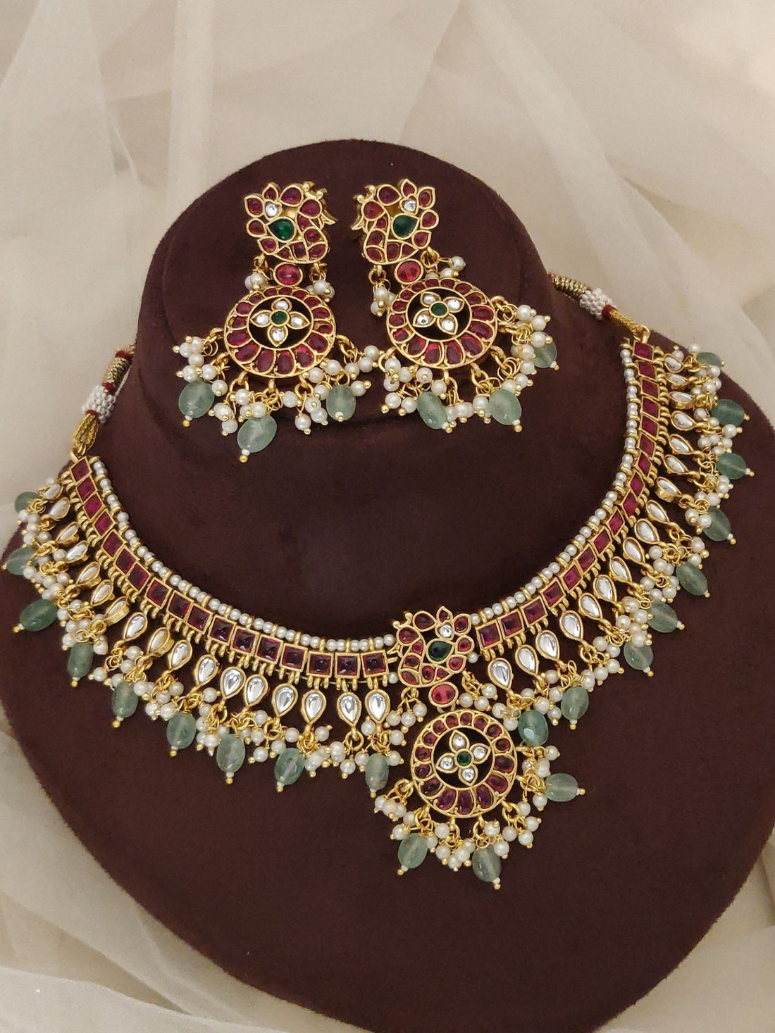 Abdesignsjewellery gold Kundan choker with red and green stones and pearl drops fashion statement necklace earrings combo