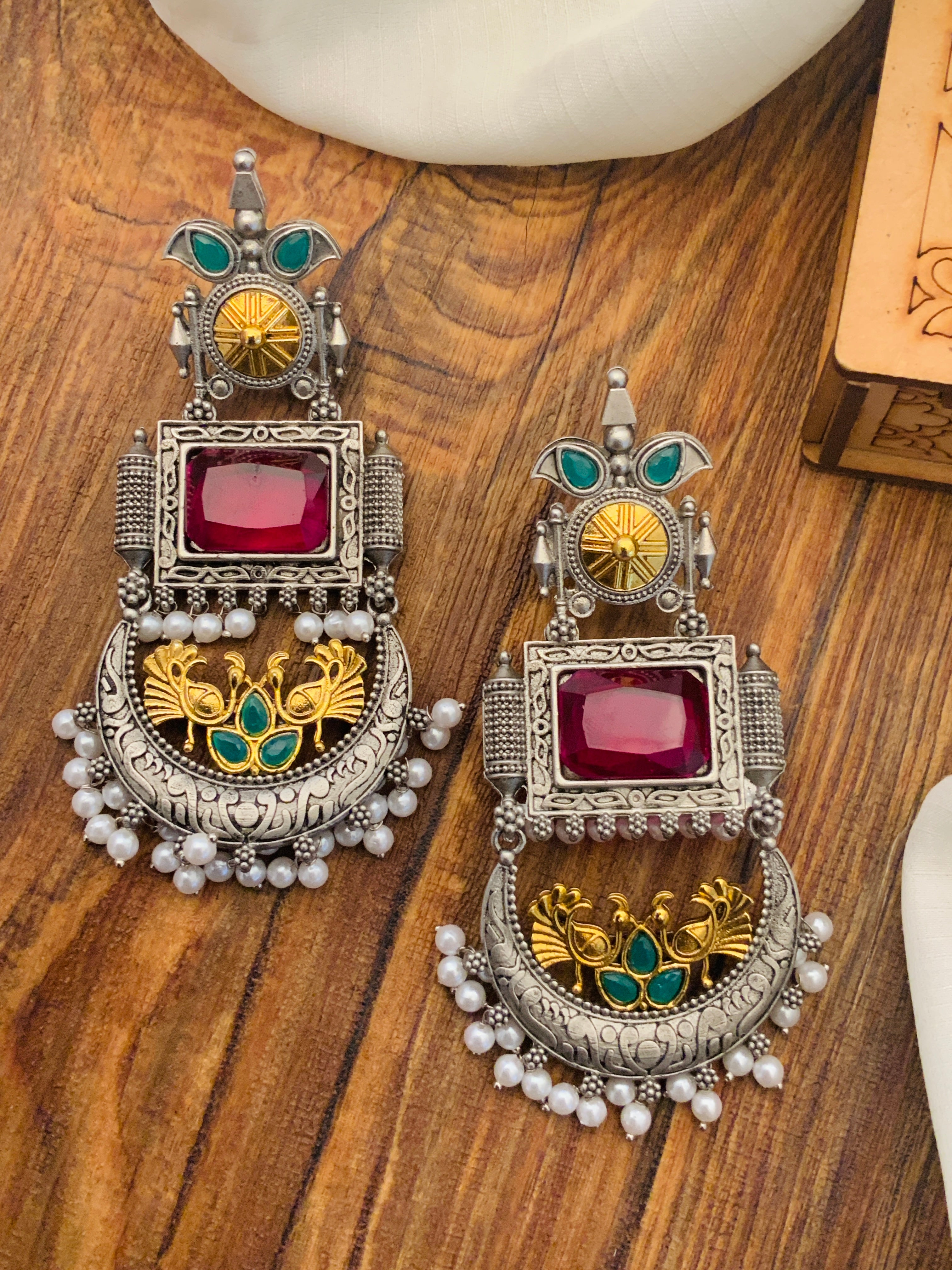 Abdesignsjewellery German Silver Dual Tone Peacock Earrings with green and red stones and pearl accents