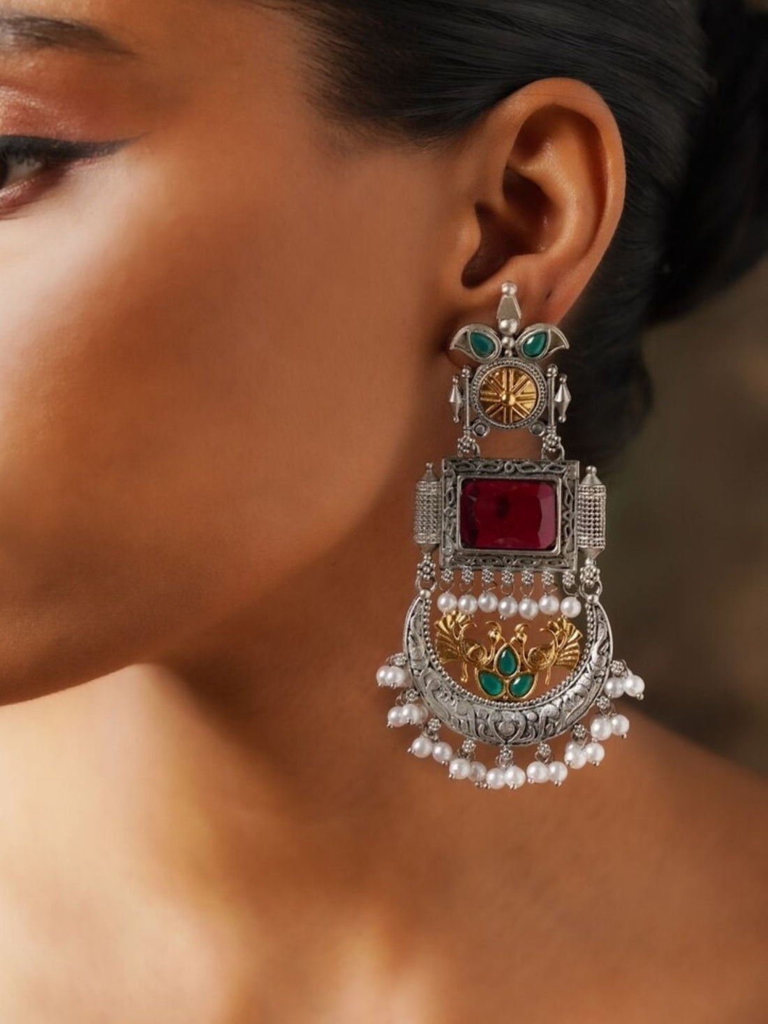 Abdesignsjewellery German Silver Dual Tone Peacock Earrings with intricate design and pearl accents