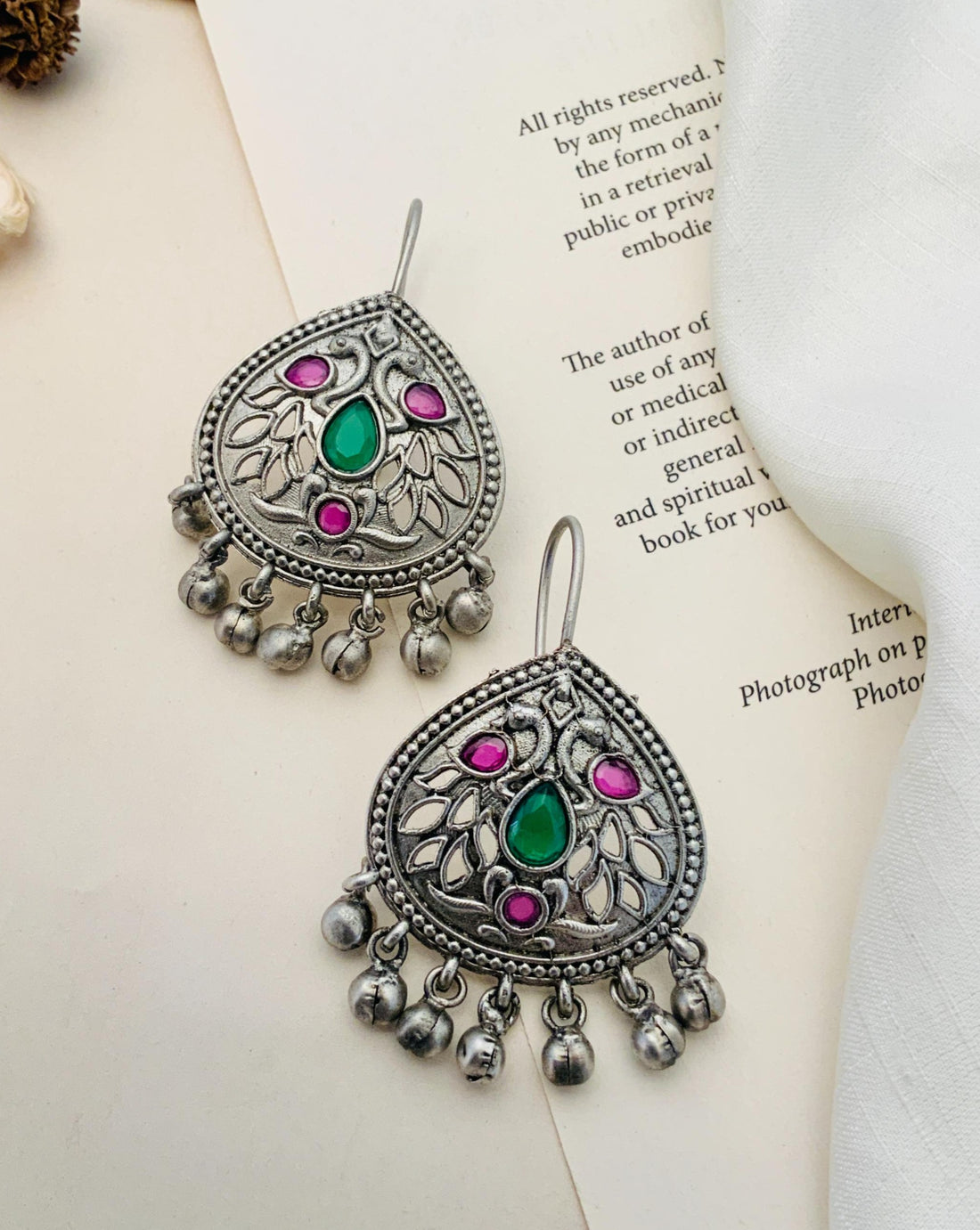 Abdesignsjewellery German Silver Earring with blue stones and pearl detailing worn by woman