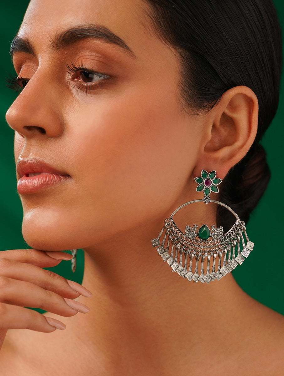 German Silver Plated Chandbali Style Earring by Abdesignsjewellery worn by woman with green and silver floral design