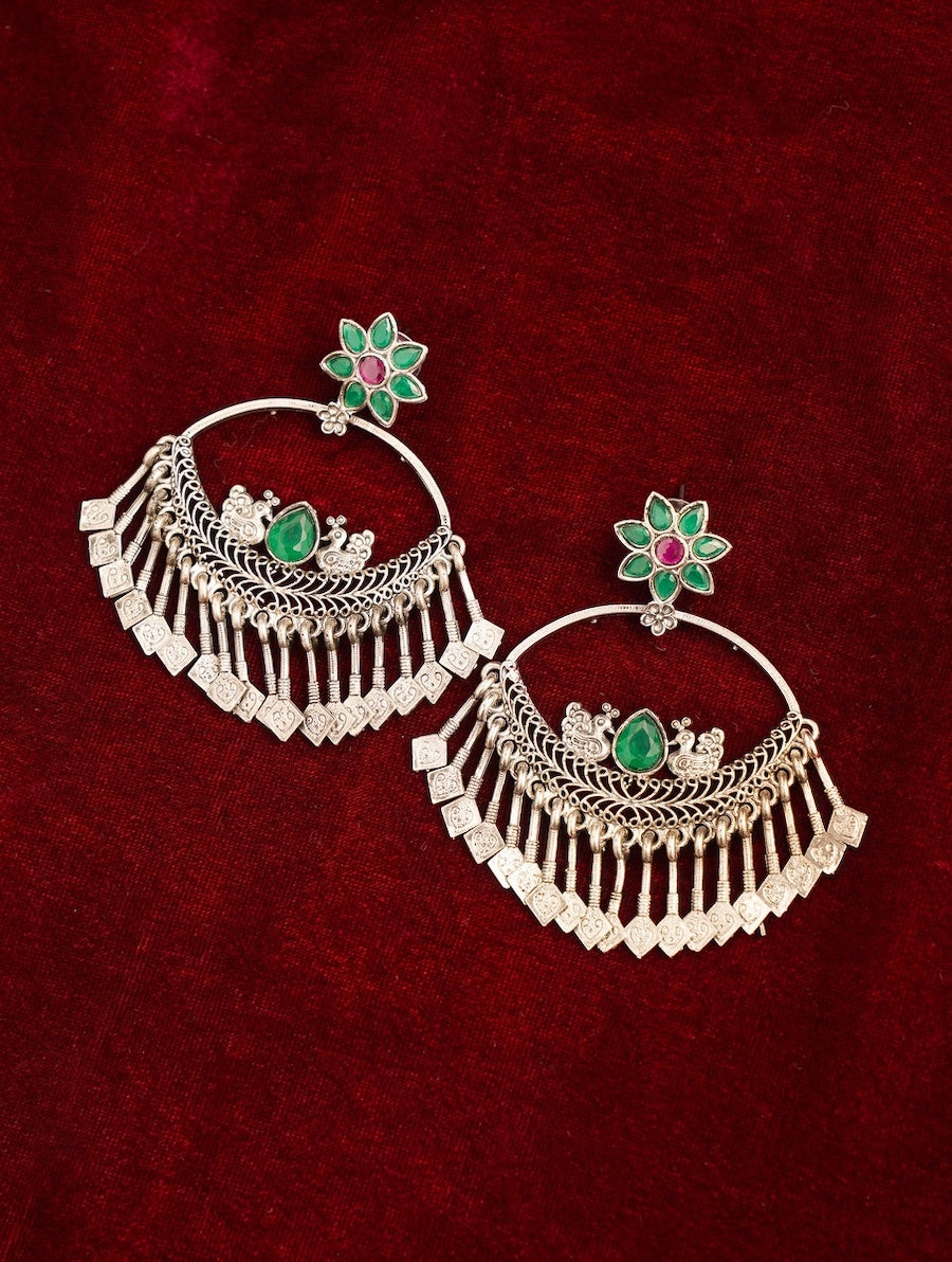 Abdesignsjewellery German Silver Plated Chandbali Style Earring with green and purple floral design on red background