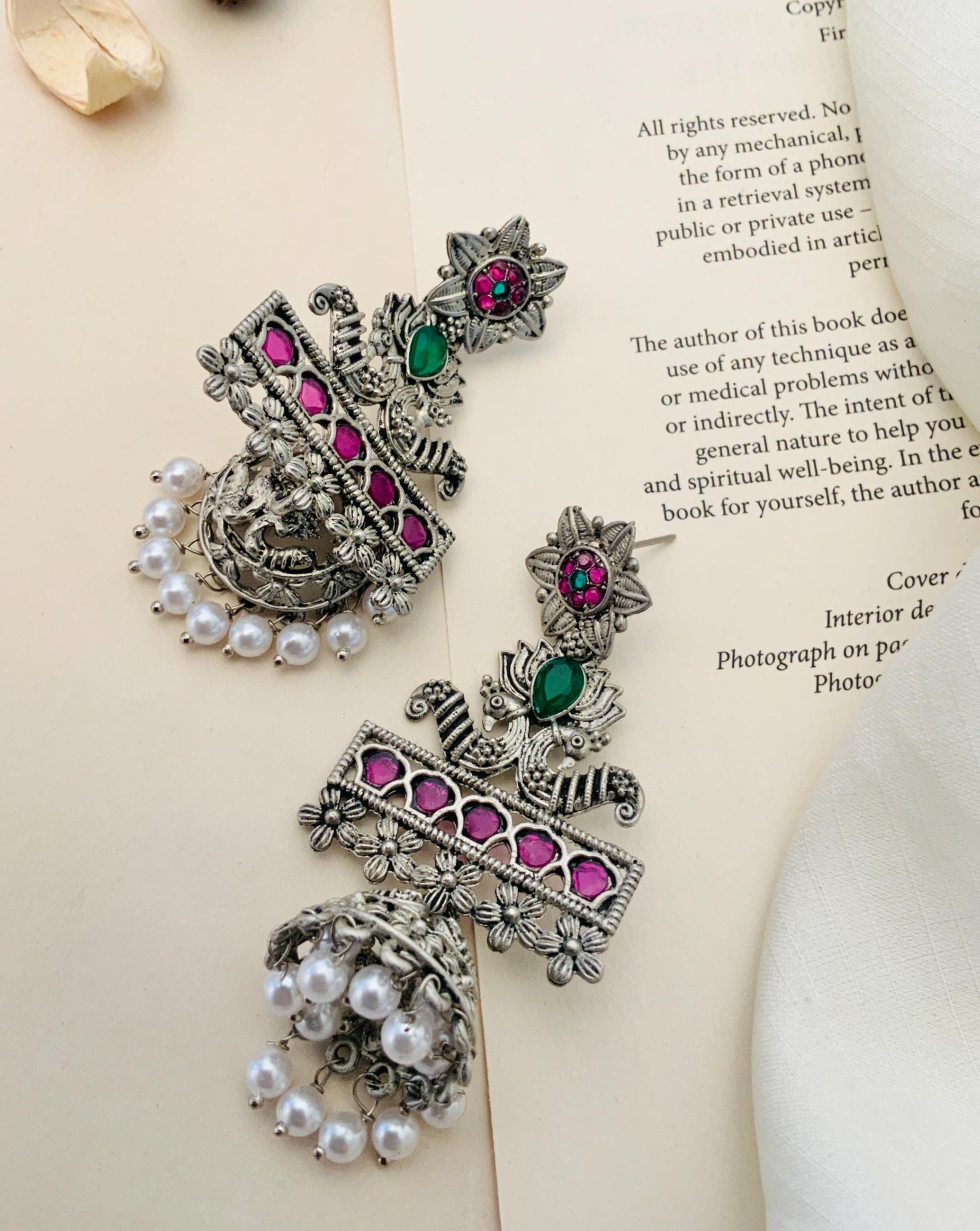 German Silver Plated Long Peacock Earrings with intricate floral design and pearl dangles by Abdesignsjewellery