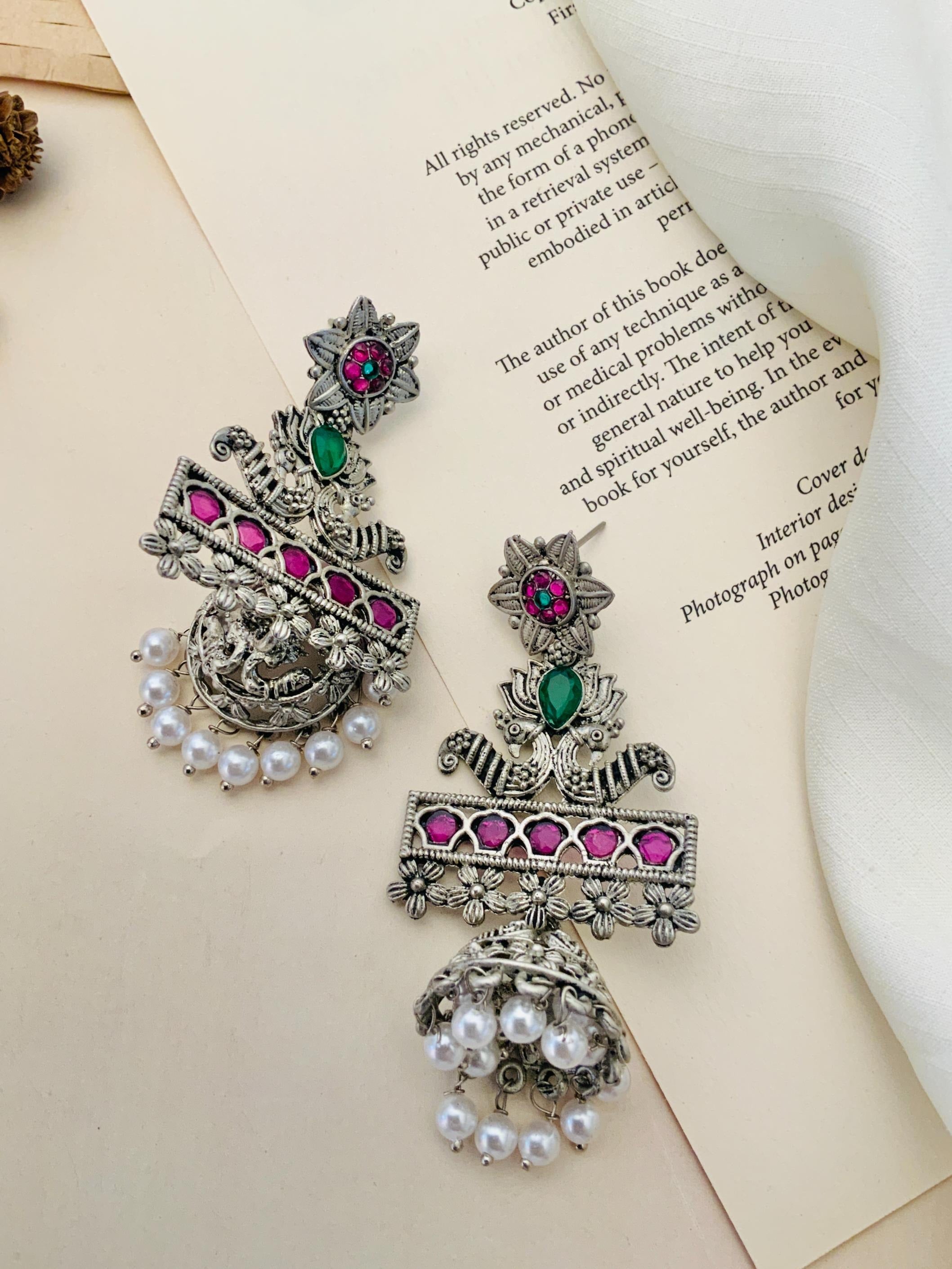 Abdesignsjewellery German Silver Plated Long Peacock Earrings with pink and green stones and pearl accents