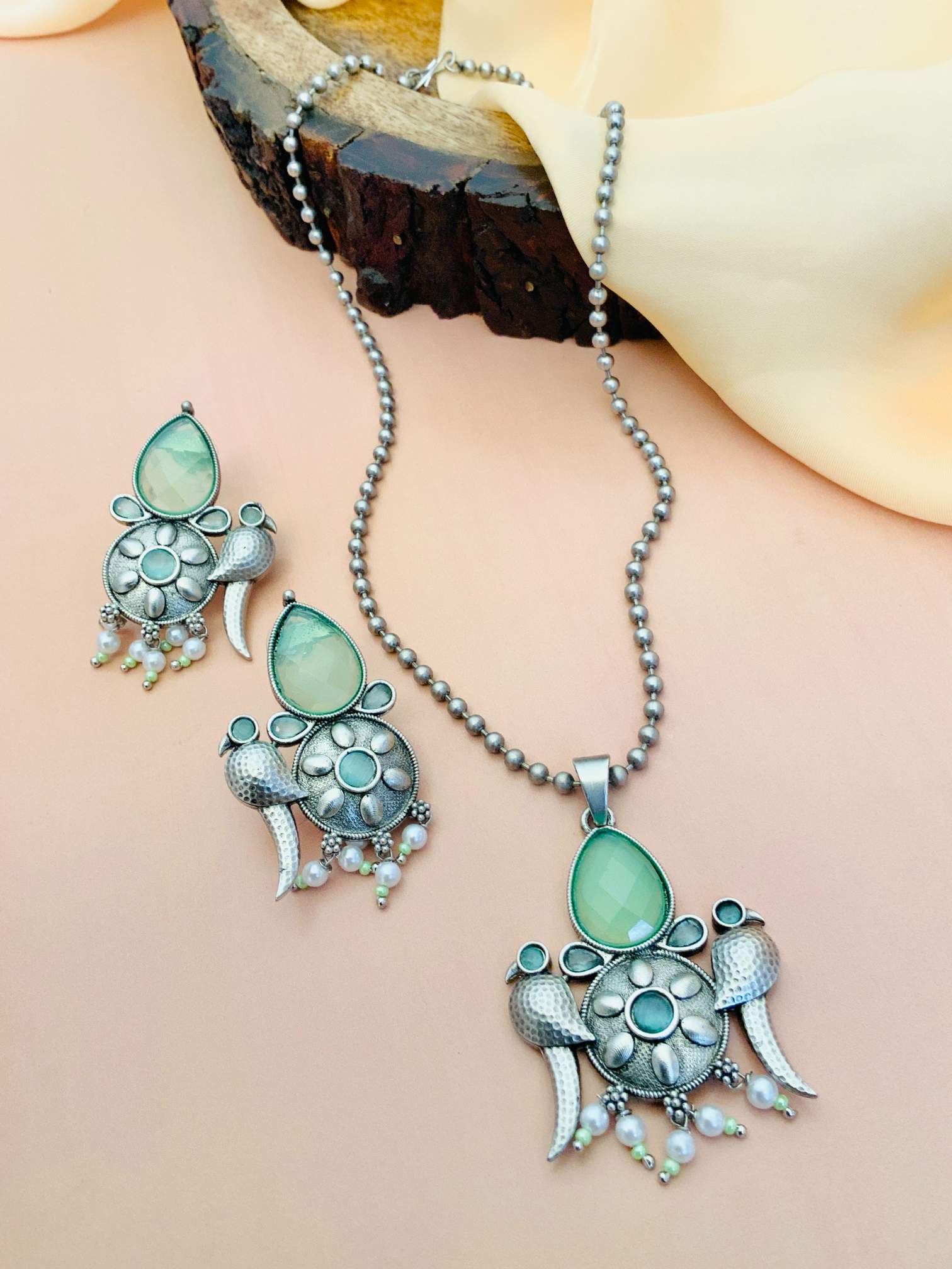 Abdesignsjewellery German Silver Plated Necklace Set with green stones and intricate floral design
