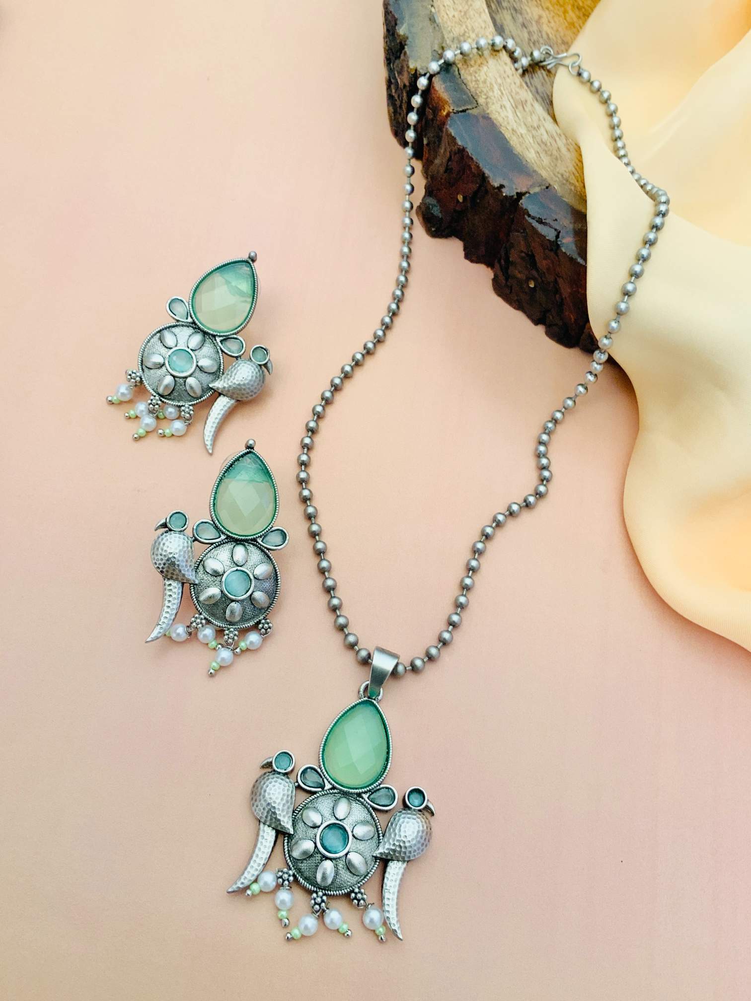 German Silver Plated Necklace Set with green stones and intricate bird design by Abdesignsjewellery