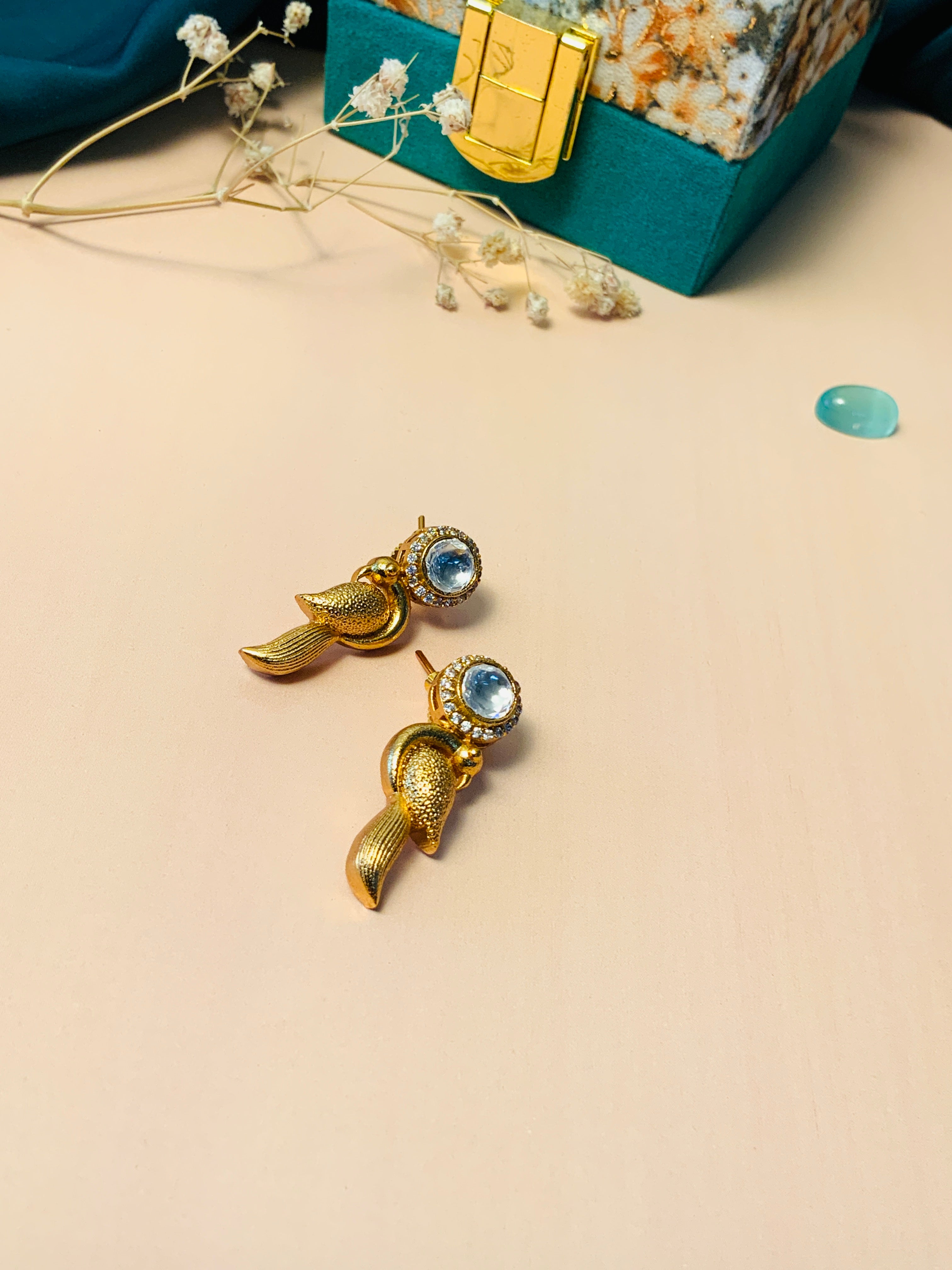 Gold-tone Glass Kundan Polki Parrot Studs Earrings with blue stones and intricate detailing