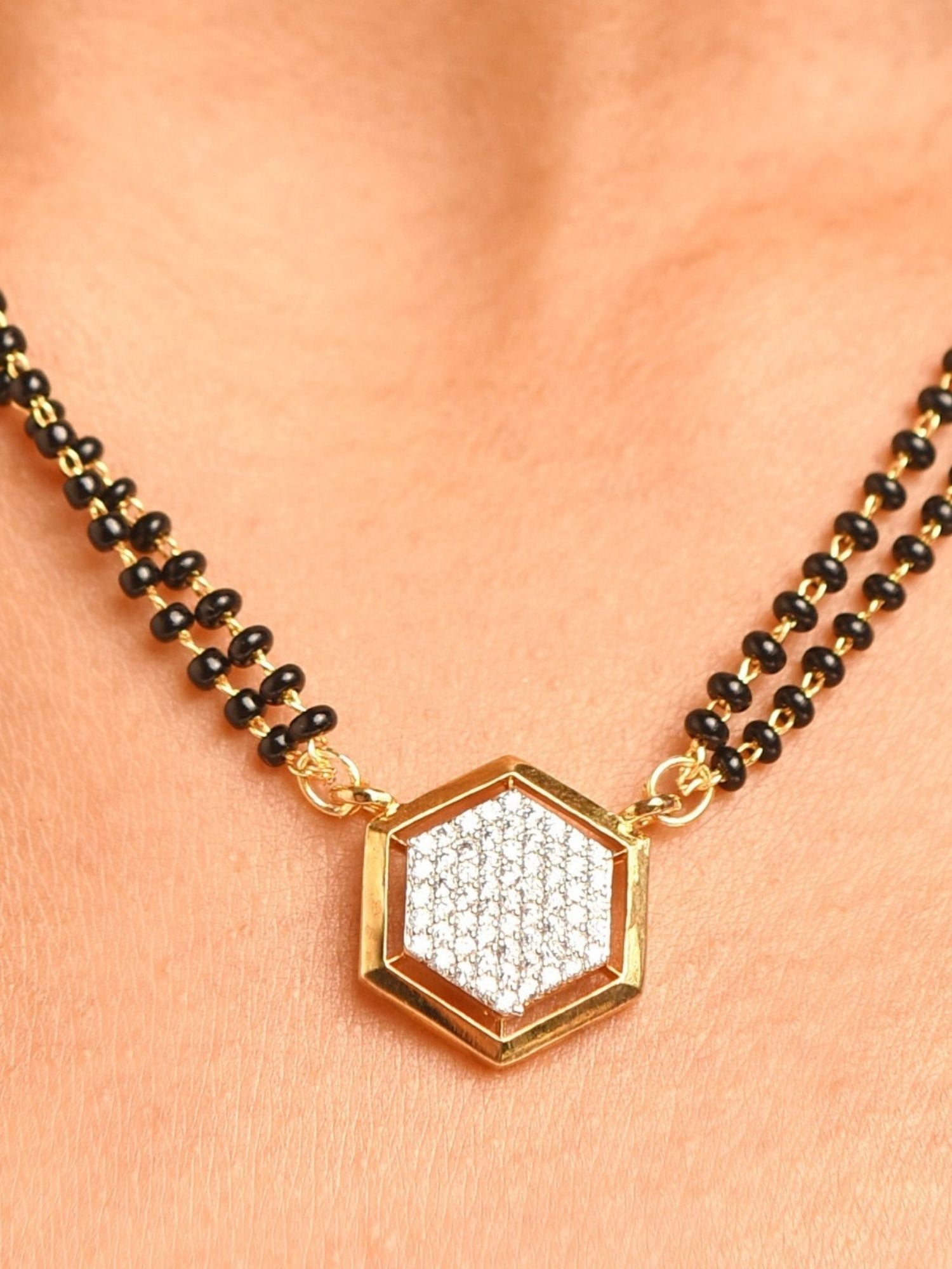 Abdesignsjewellery gold plated American diamond mangalsutra set with hexagon pendant and black bead chain on neckline