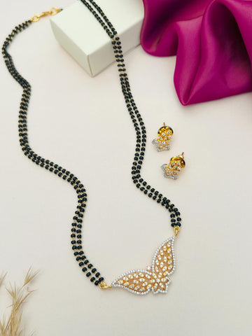 Abdesignsjewellery gold plated American diamond mangalsutra set with butterfly pendant and matching earrings on display