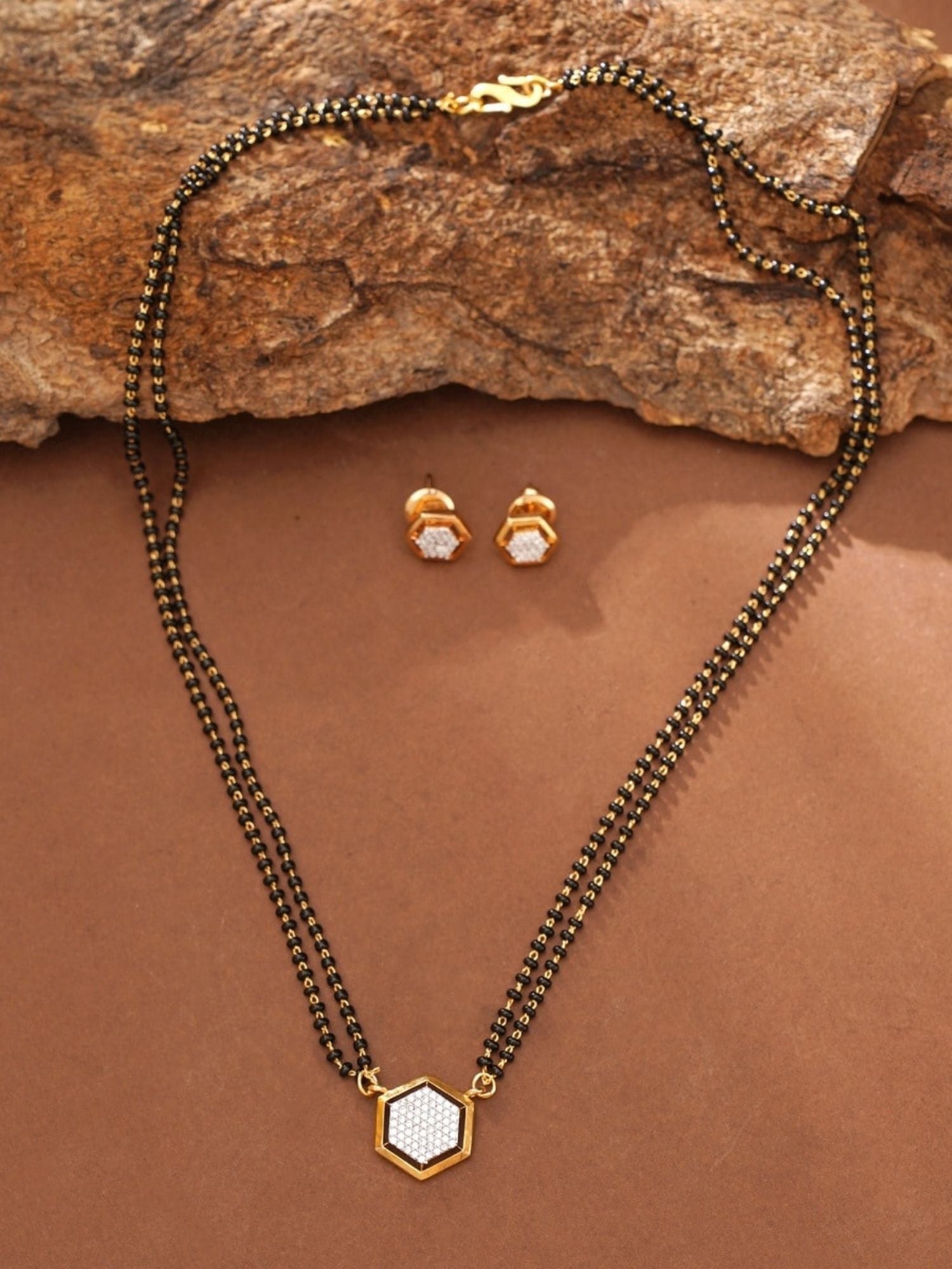 Abdesignsjewellery gold plated American diamond mangalsutra set with hexagon pendant and matching studs